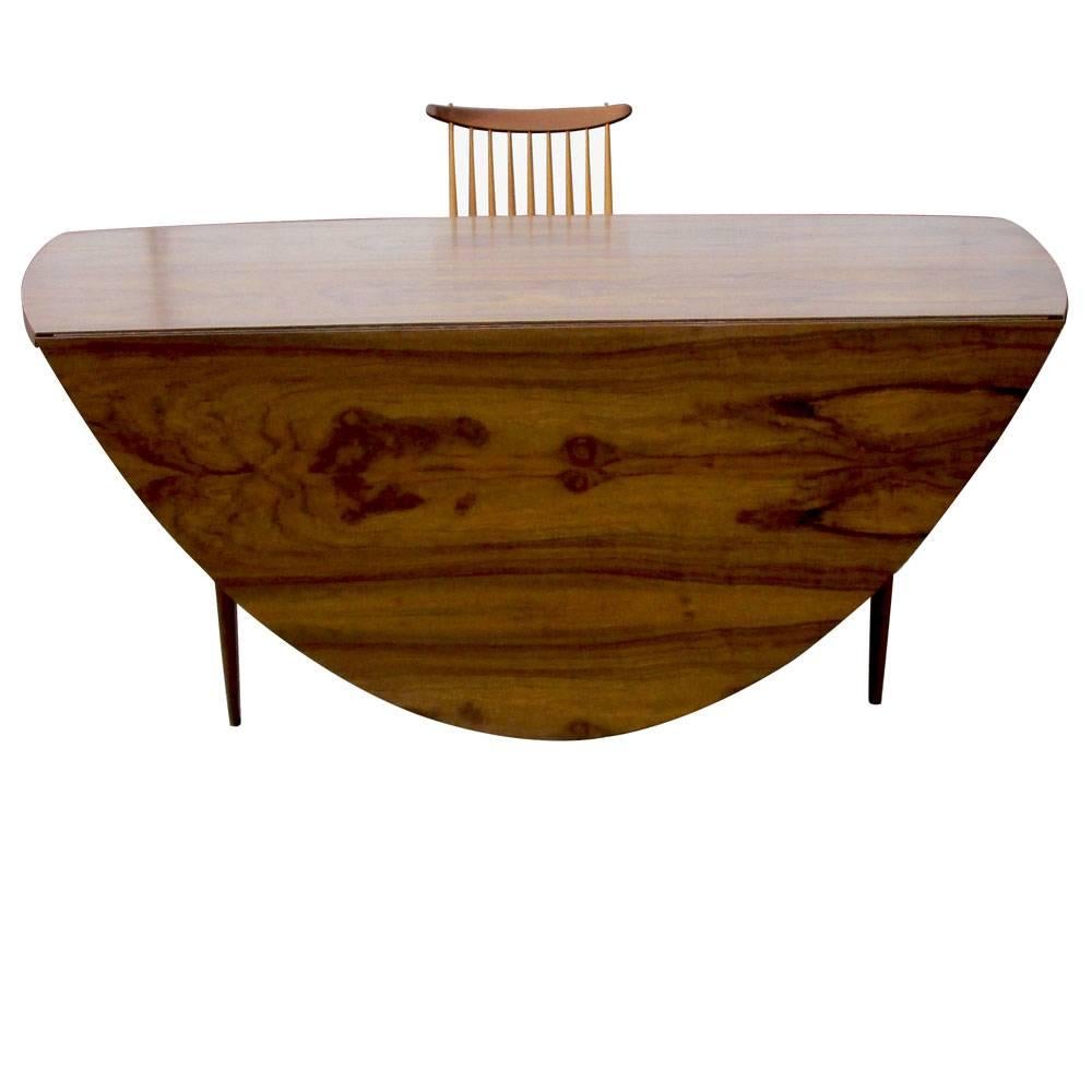  George Nakashima 
1960-1969 
George Nakashima.s "Origin Collection," was inspired by Japanese and Shaker furniture. The collection consisted of bedroom and dining room pieces 

Drop Leaf Dining Table from the Origin Collection