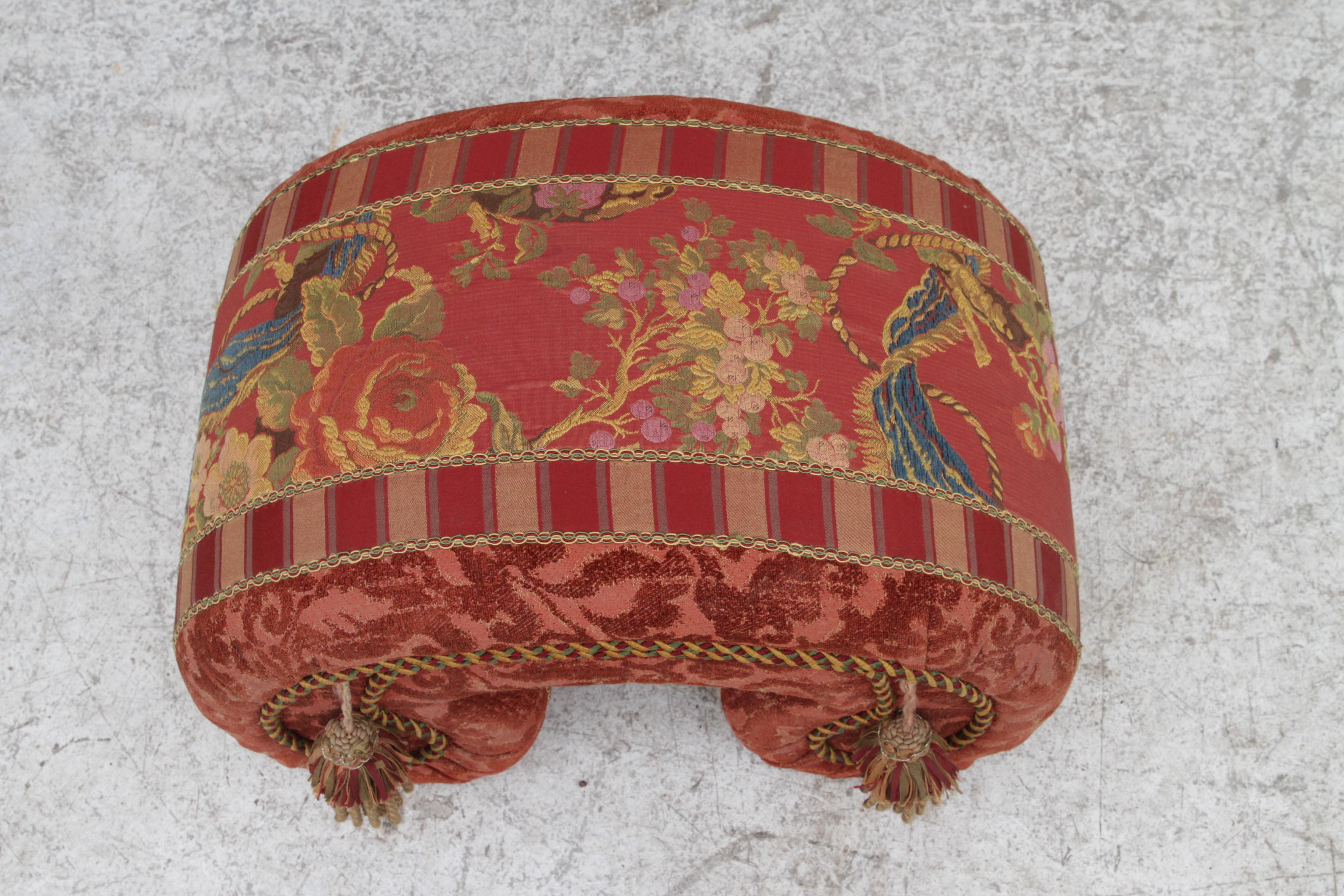This adorable little footstool is upholstered in a great detailed chinoiserie fabric with rope and tassel piping. Heavily scrolled feet complete this cute addition to your home.
Dimensions: 
Length: 14