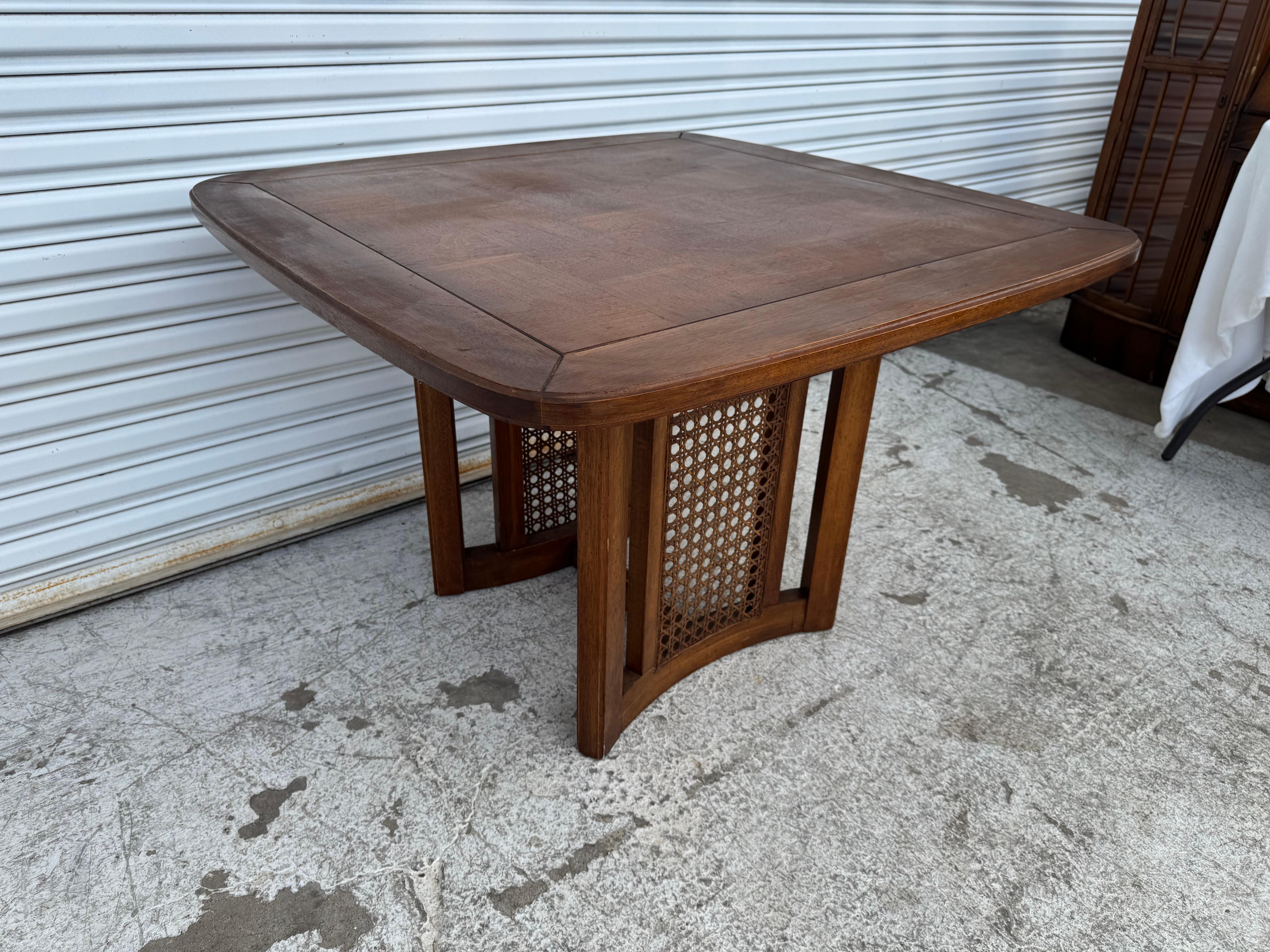 A gorgeous 1960's table that holds a beautifully grained checkerboard parquet top in 5
