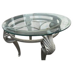 Tavolino decorativo con piano rotondo in vetro