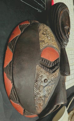 Masque mural décoratif circulaire ghanéen