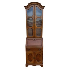 Thomasville oak secretary desk with a matching display hutch.