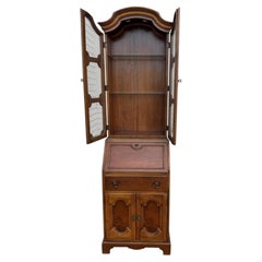 Thomasville oak secretary desk with a matching display hutch.