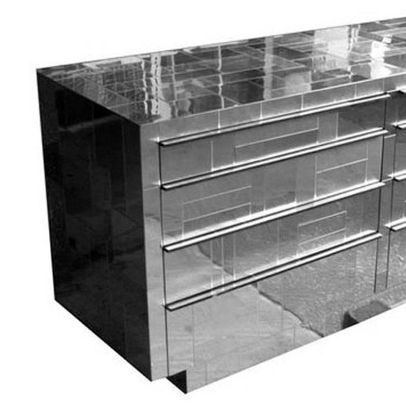 Iconic cityscape credenza in mirrored chrome with eight drawers and two doors by Paul Evans. 

Chrome-plated and damaged plates were replaced. Measures: 90