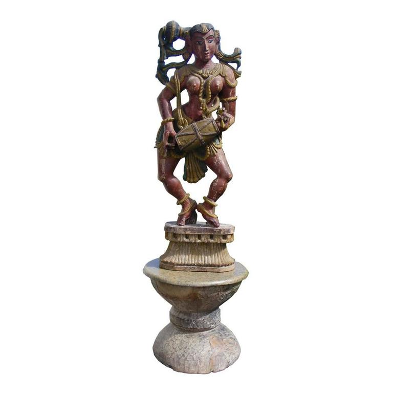 18th century poly-chrome statue depicting Hindu Deity. This 18th century statue is made of painted clay, plaster and wood.