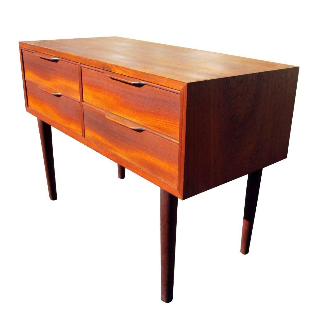 Vintage Mid-Century Modern Danish teak four-drawer console
Can work as a floating low boy, server, console 
Made in Denmark.