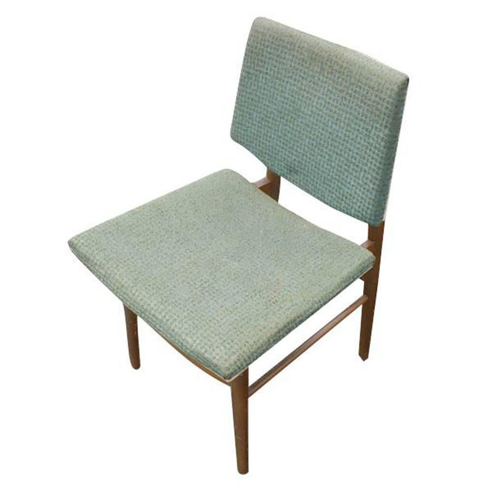 Six vintage Scandinavian teak dining chairs 

Green and blue original fabric upholstery 
 
Tapered legs and frame.
 