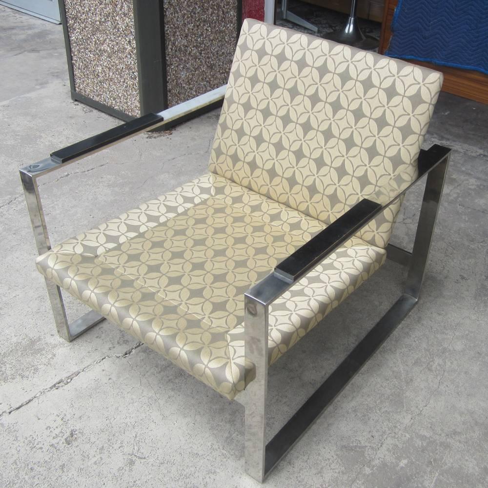 A vintage pair of lounge chairs in the manner of Milo Baughman 

Chrome frame and fabric upholstery.


 