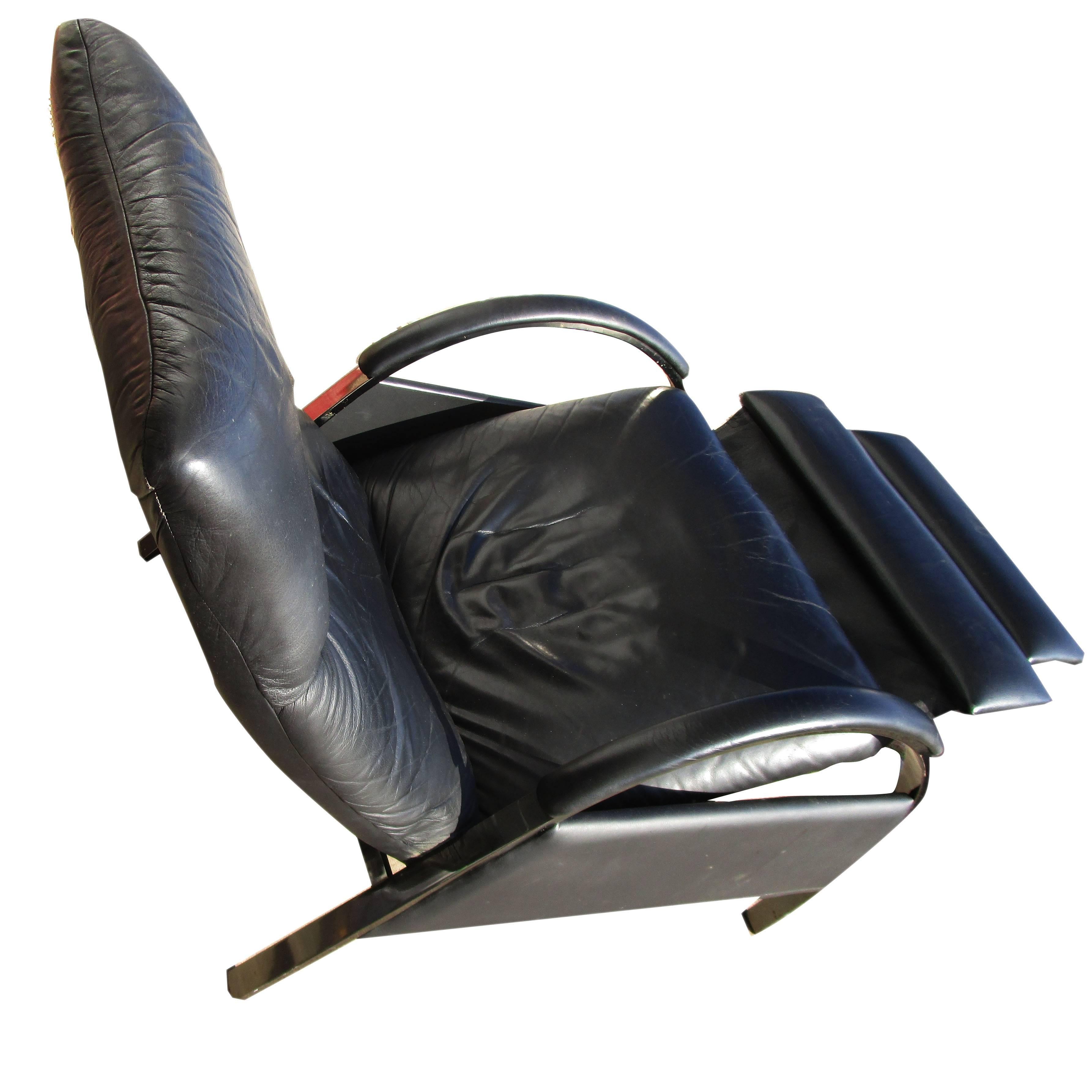 Three position reclining leather lounge armchair with swing out foot rest
designed by George Mulhauser for Design Institute of America
1980s.
         