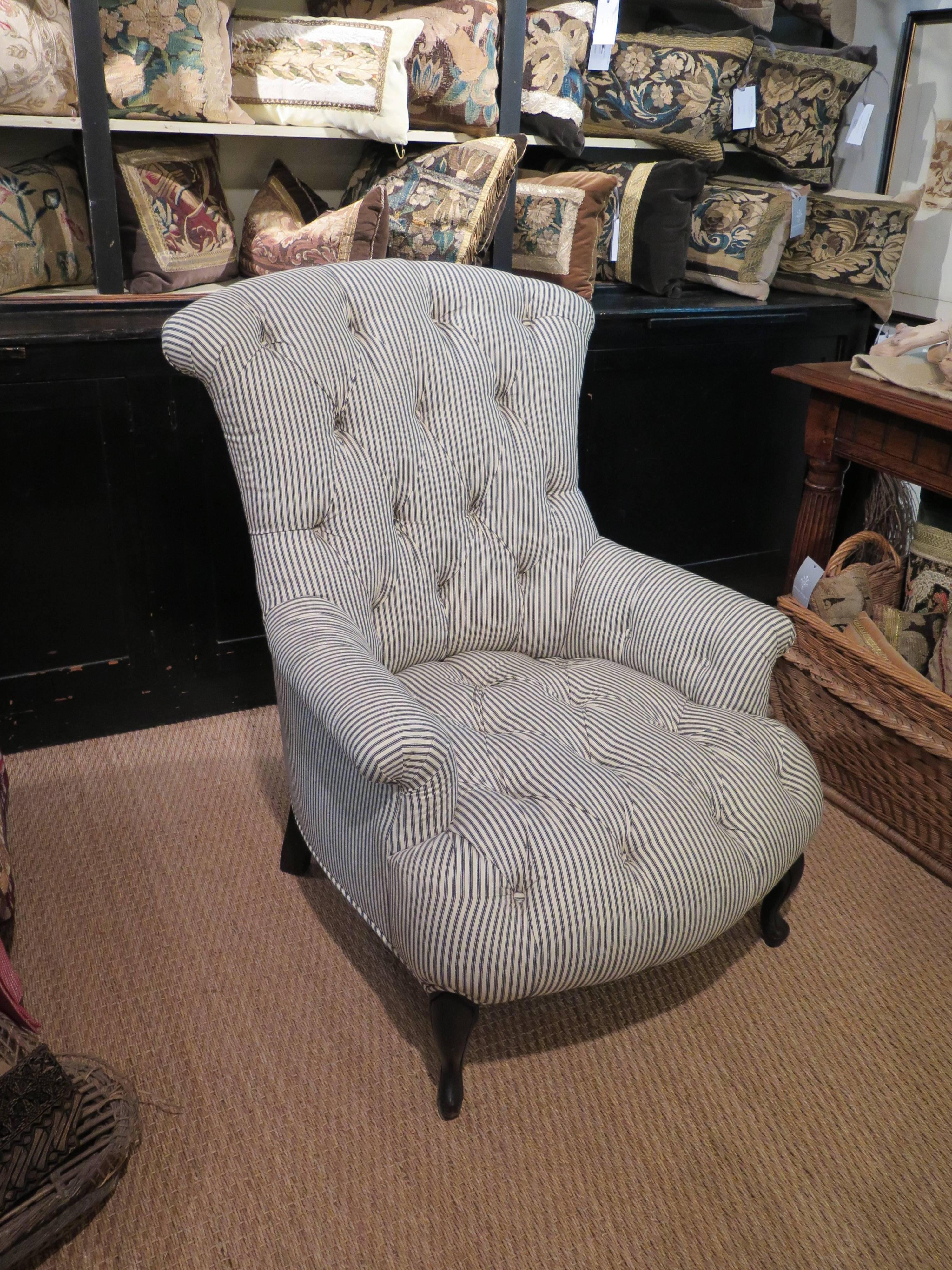 Newly upholstered armchair with Classic striped pattern on antique French frame. The chair is 37" tall to the top of the back. The seat is 24" deep, but the chair measures 36" deep to the wall.
     