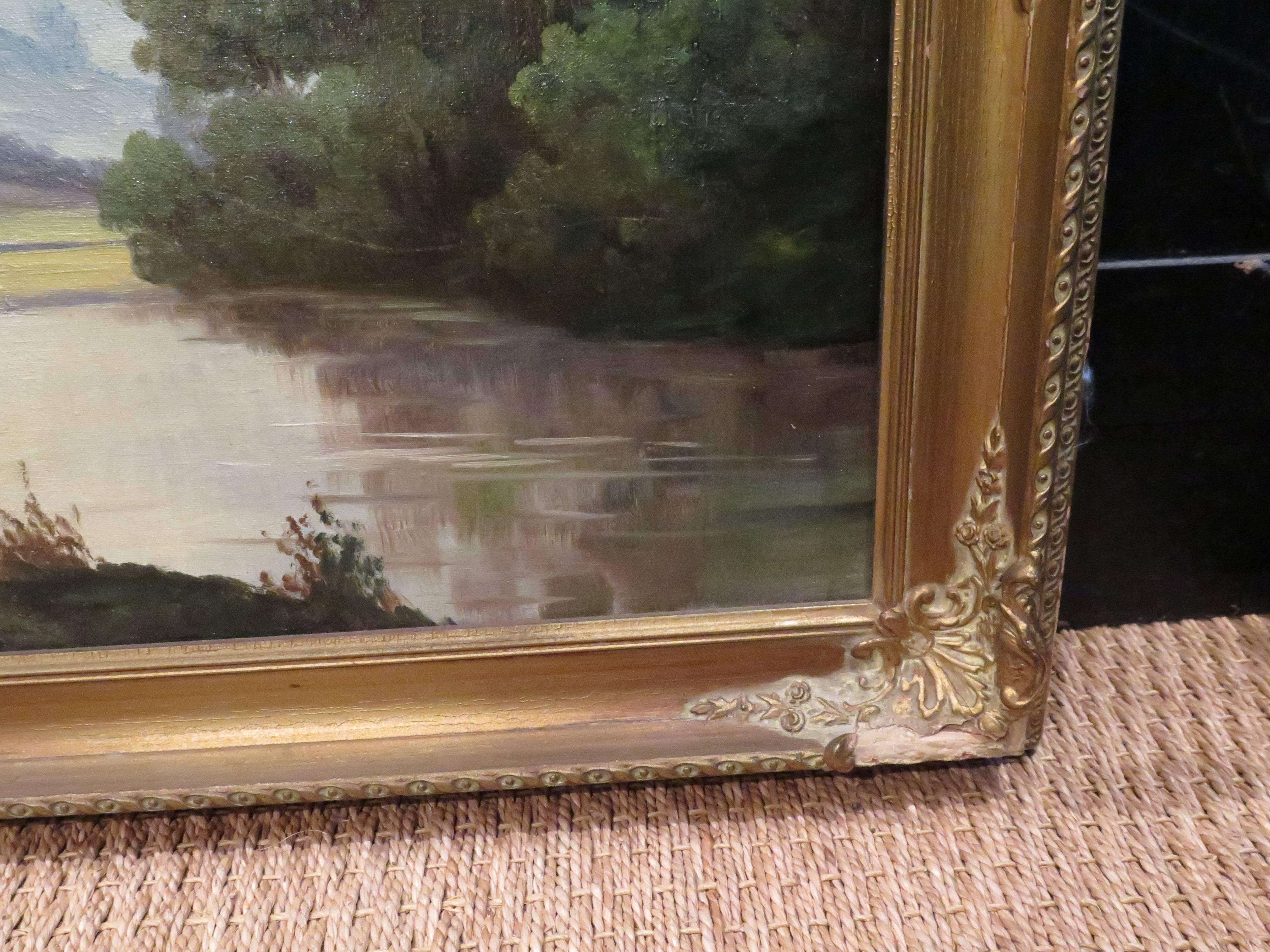 Beautiful oil on canvas landscape in antique gold frame.