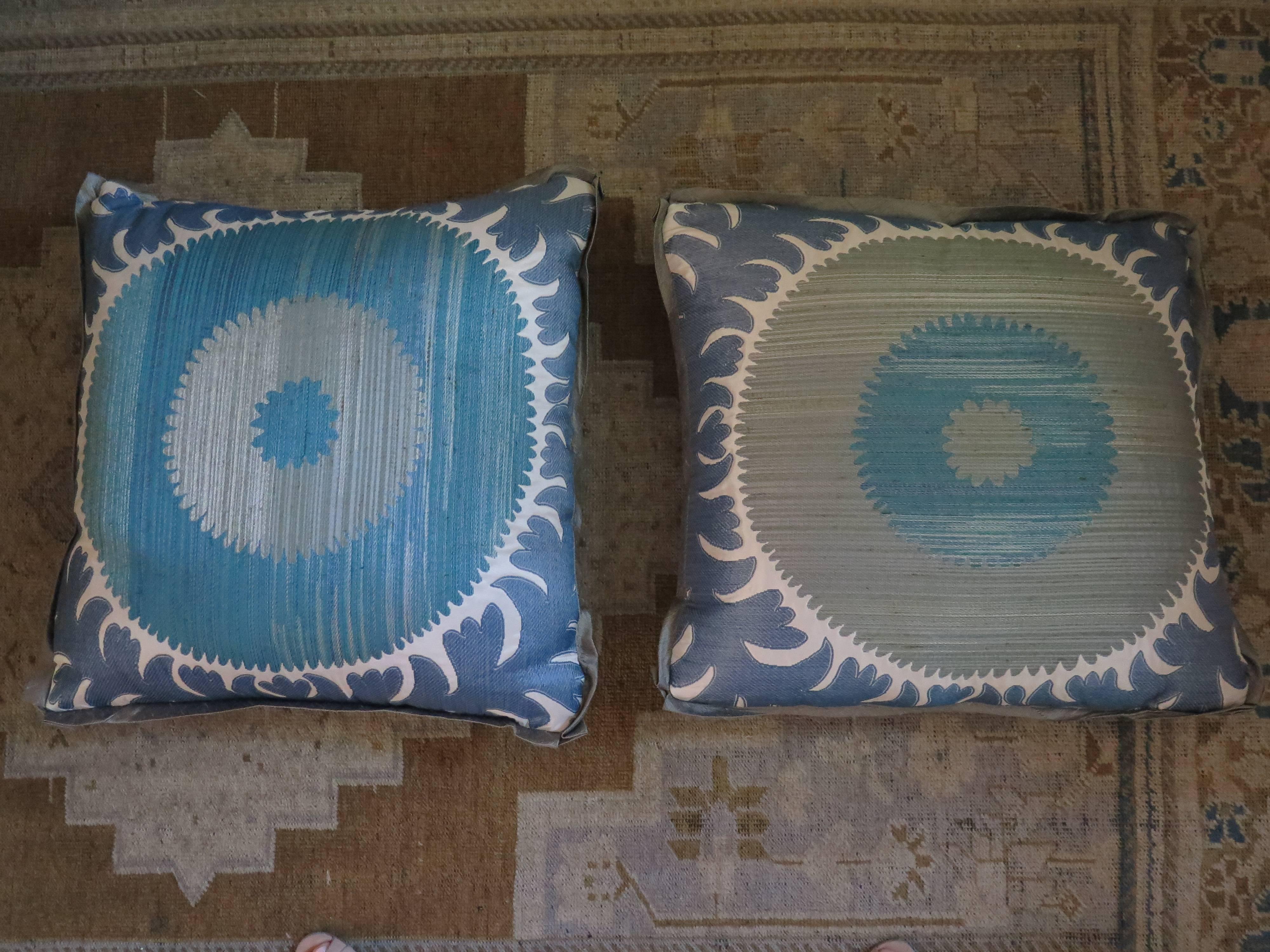Pair of custom Donghia Suzani pillows with flange. Down filled.