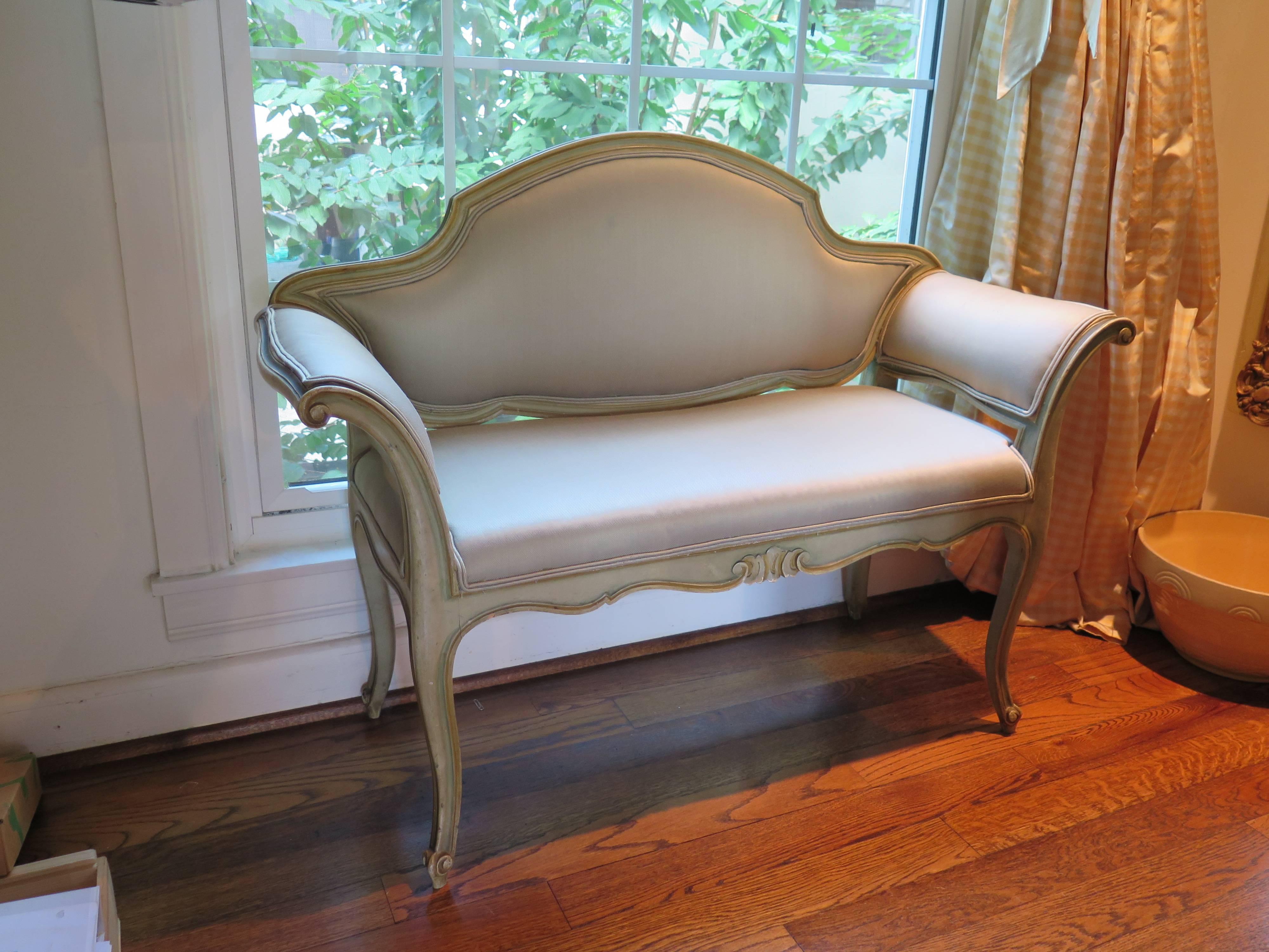 19th century petite settee upholstered in beautiful pale sage silk.