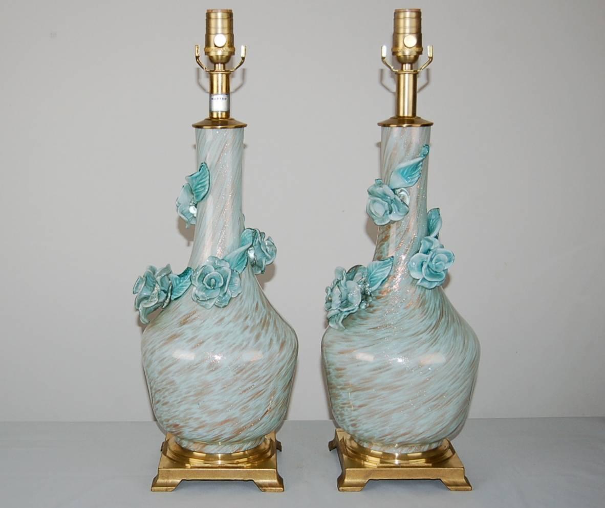 Exquisitely elegant in Robin's egg blue and copper, with applied glass roses vining the neck. So rare to find a matched pair in such perfect condition!

They stand 23 inches from tabletop to socket top. As shown, the top of shade is 30 inches
