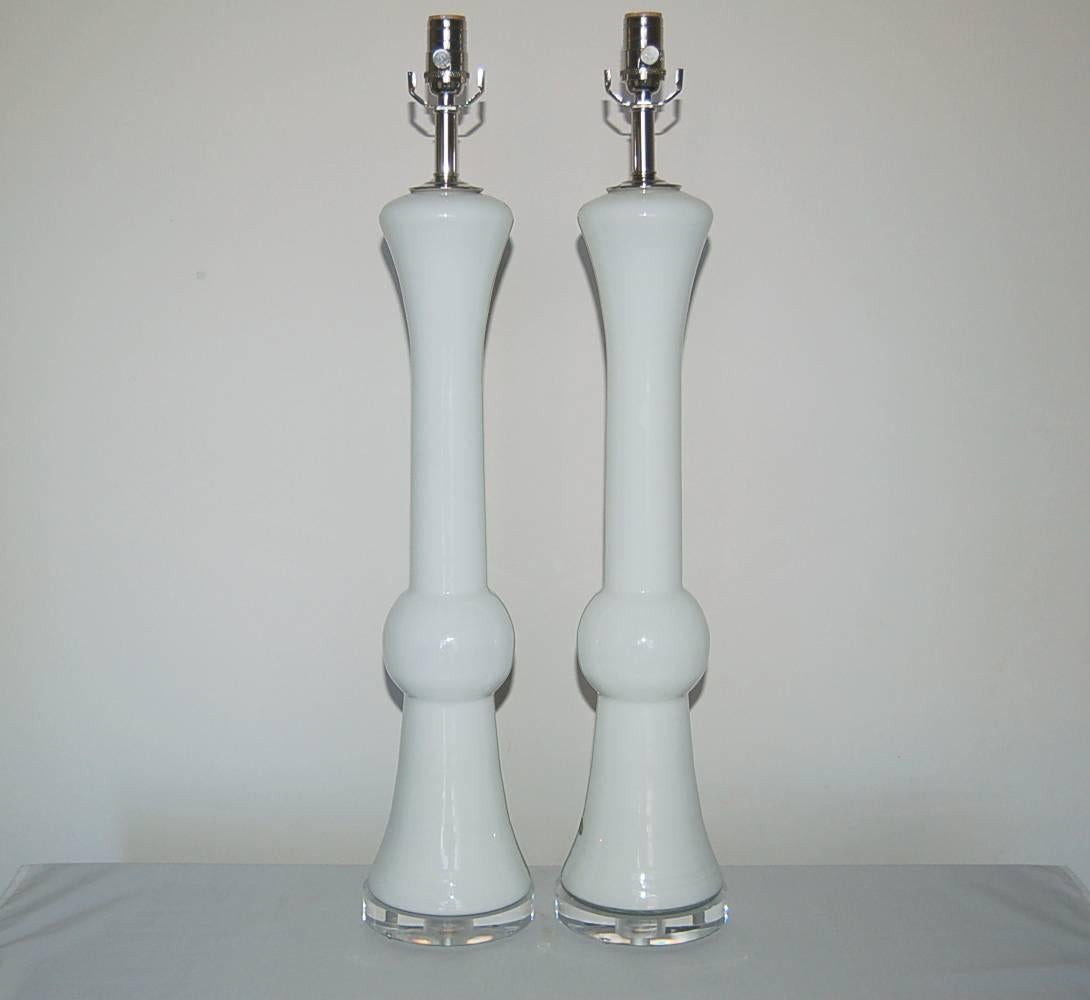 Matched pair of towering sculpted vintage Murano lamps in WHITE. A very tall and sleek matched pair. 

They stand 31 inches from tabletop to socket top. As shown the top of shade is 36 inches high. Lampshades are for display only and not available
