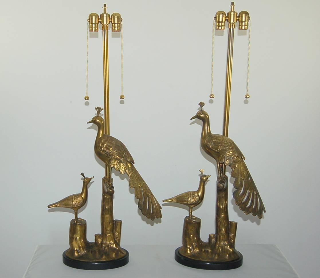 Elegant vintage matched pair of Peacock and Pea Chick lamps by The Marbro Lamp Company, with shiny BRASS and glorious patina. Though over forty years old, these lamps look showroom new.

They stand 37 inches from tabletop to socket top. As shown,