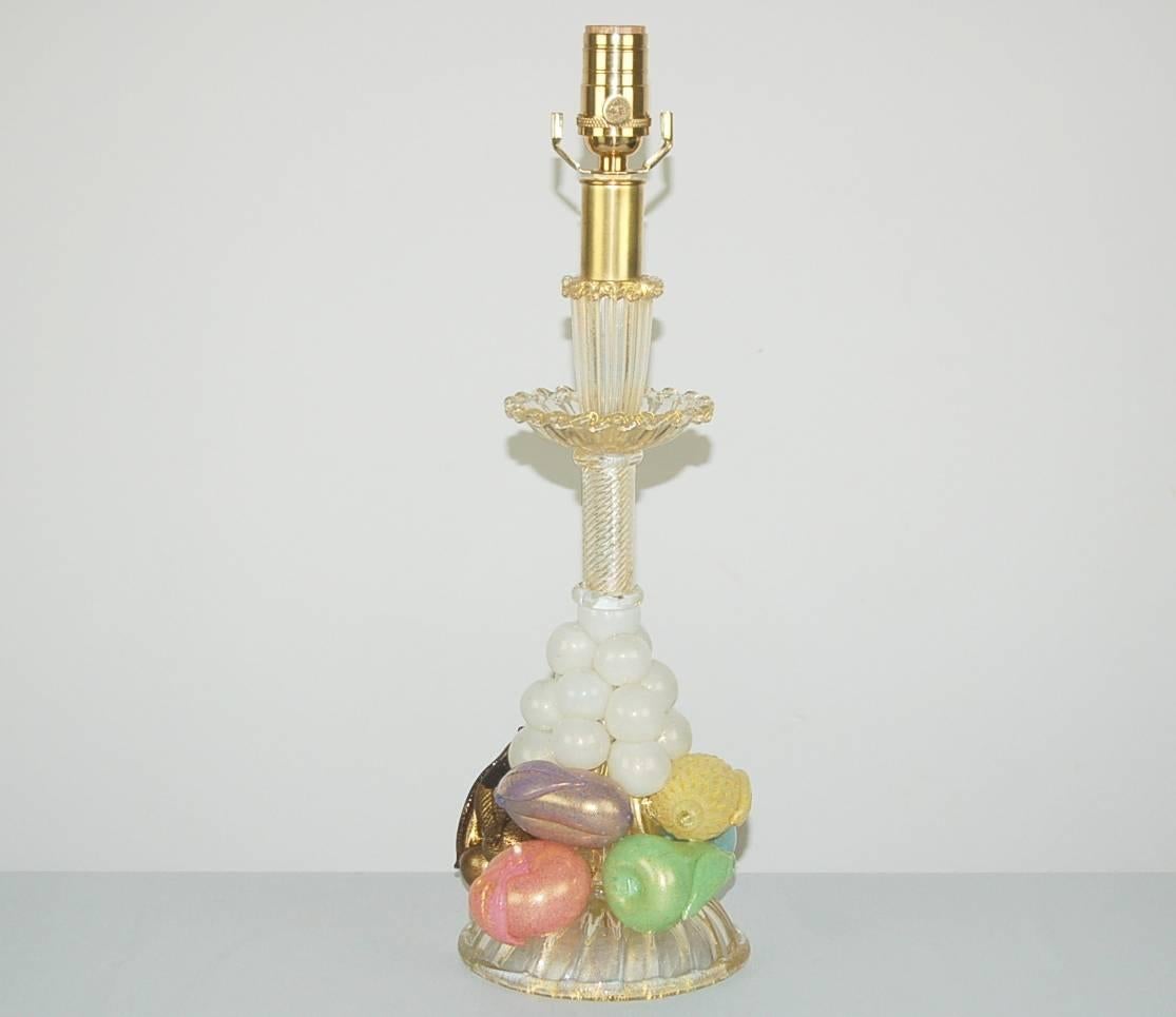 A melange of vintage Murano glass fruit, all accented with GOLD dust, by Barovier & Toso. Wonderful accent lamp with such INTENSE COLORS, including original fruit GOLD glass finial.

The lamp stands 19 inches from tabletop to socket top. As shown,