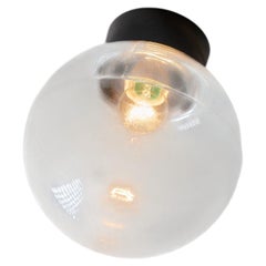 Lámpara de pared o de techo con esfera de cristal transparente y baquelita, década de los 70