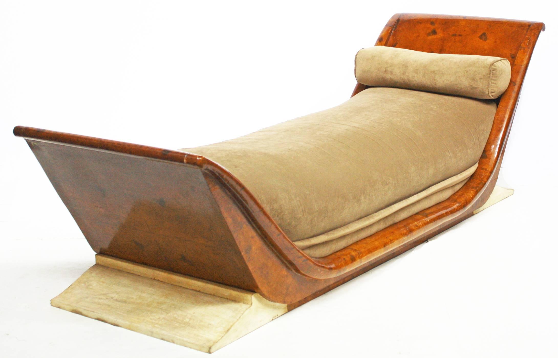 A fine and rare André Arbus (1903-1969) lacquered wood and sharkskin Gondola bed, circa1930, with lacquer work by Jean Dunand (1877-1942), upholstered in taupe ultrasuede

platform base removed.

Head of the bed is 31