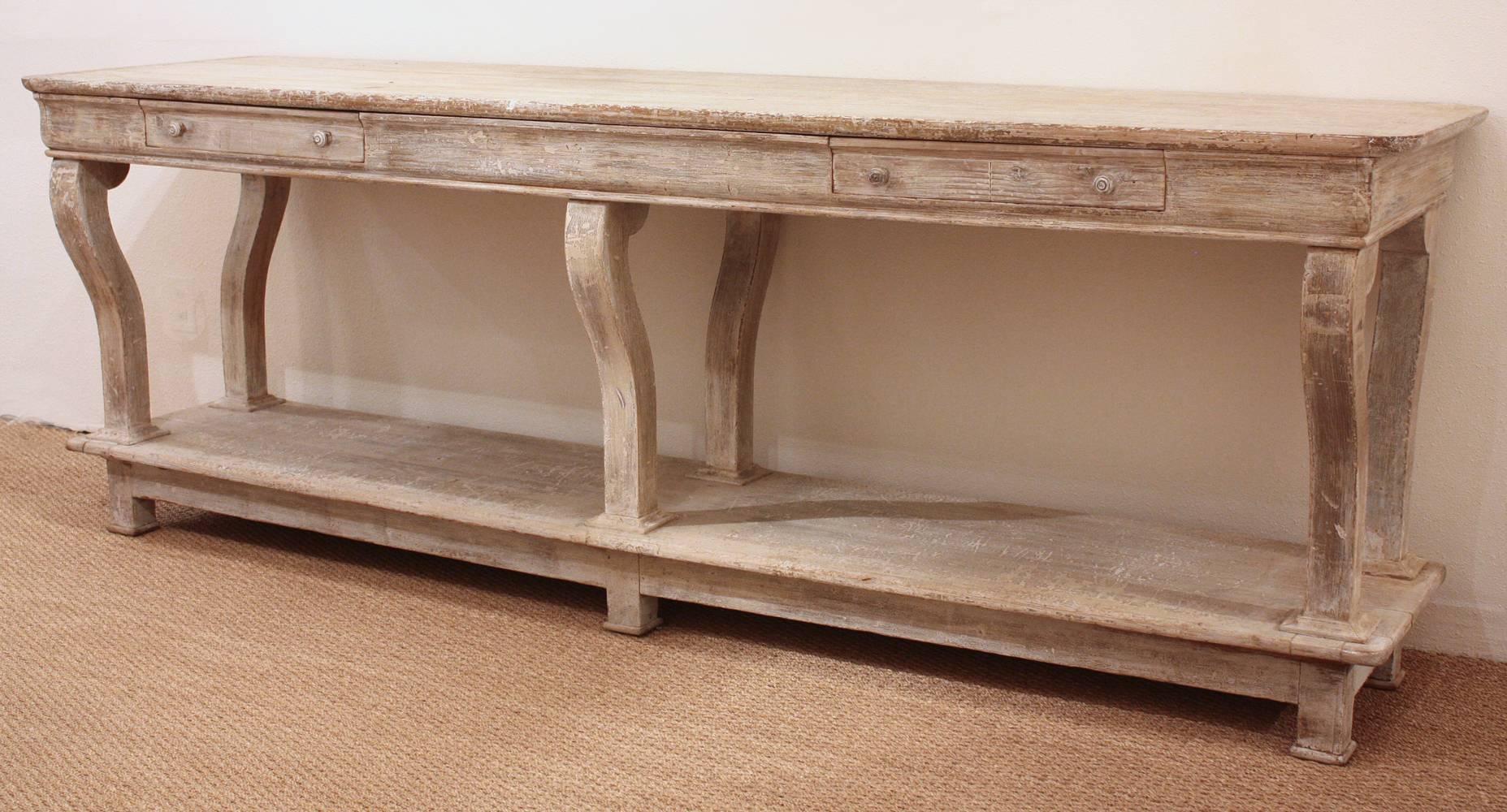 Exceptional mid-19th century French console table, with original white painted finish, two drawers on one side, finished on all four sides (could be floated in a room) sturdy condition.