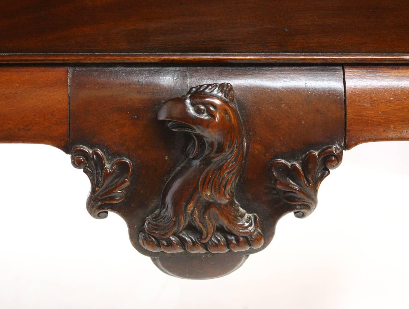 Carved George II Irish Serving Table with Crest, a Cock's Head Erased