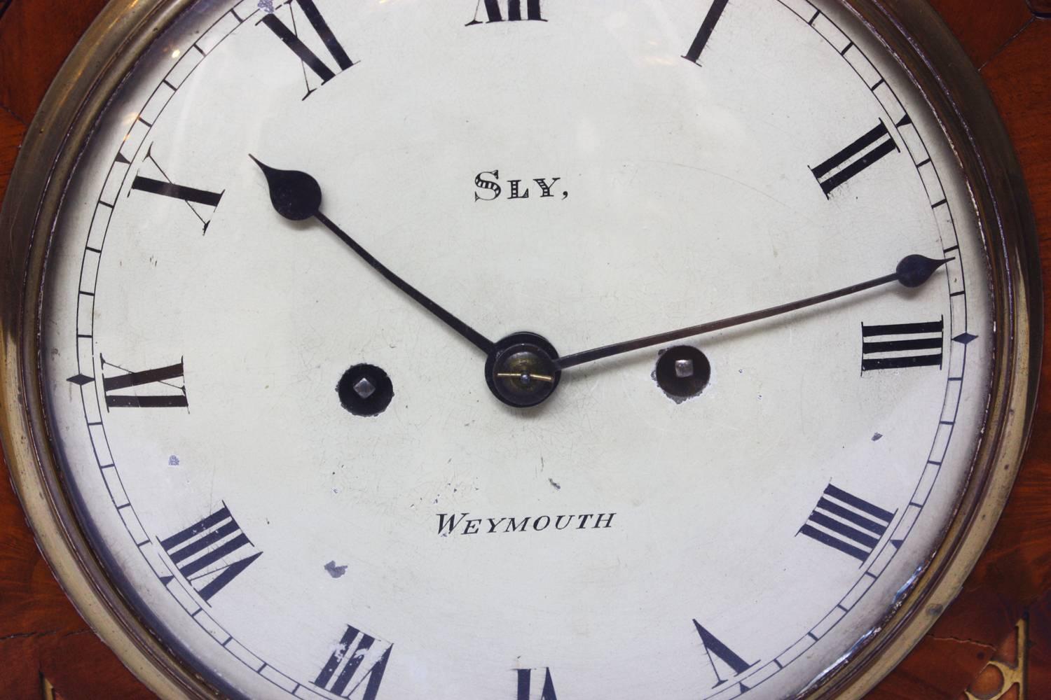 George II Mahogany Arched-Top Bracket Clock by Sly, Weymouth, England In Good Condition For Sale In Dallas, TX