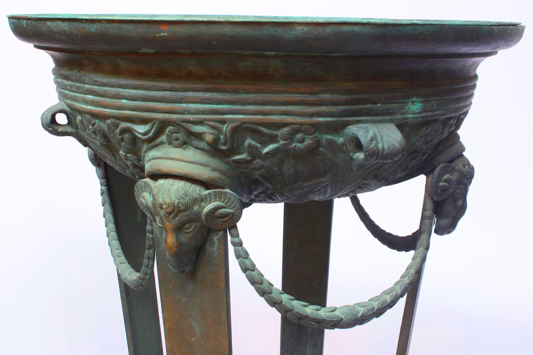 Patinated bronze neoclassical braziers / torchieres / plant stands in the Pompeian style, with a circular shallow basin (15.75