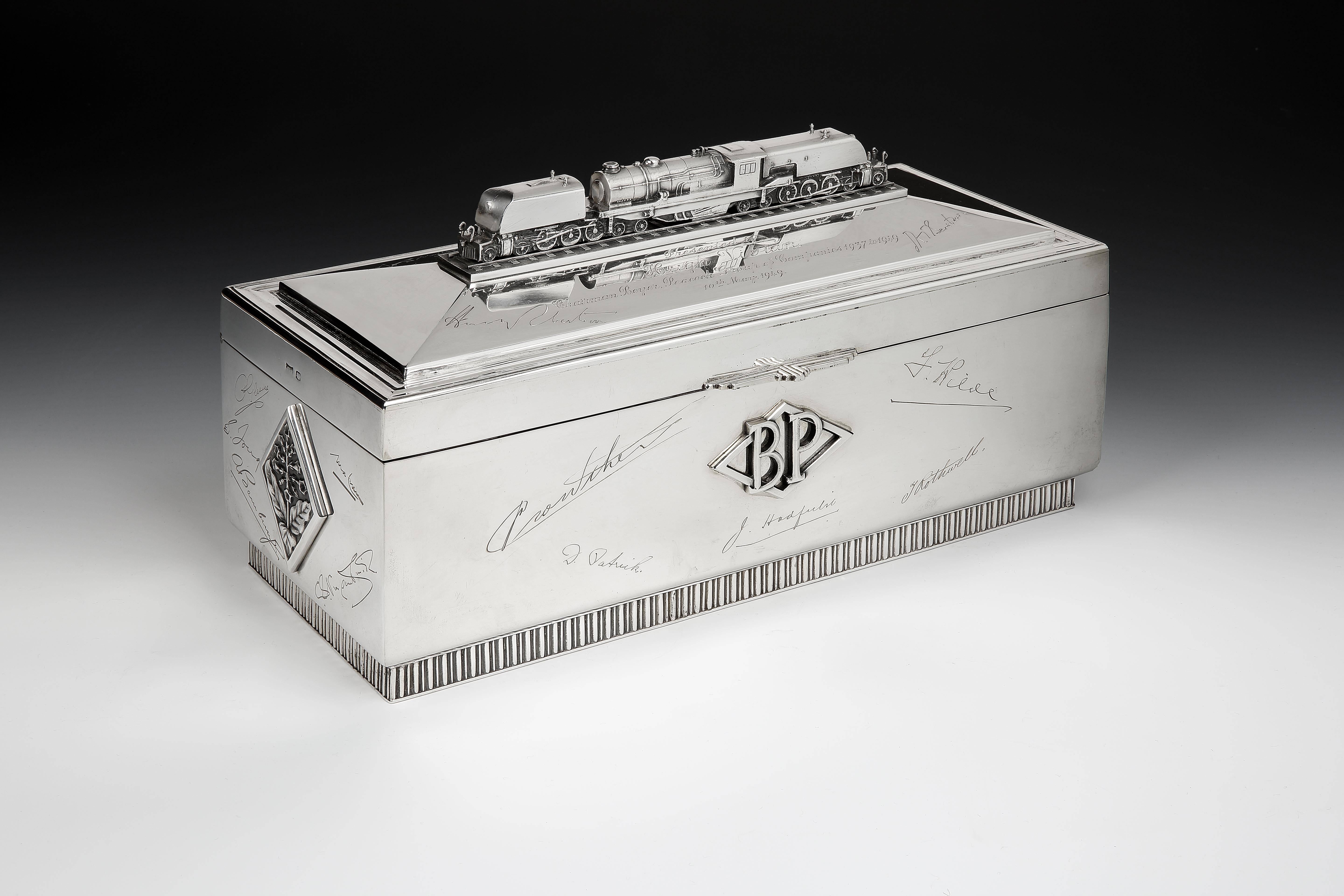A massive and extremely impressive, Sterling silver cigar box made by the well-respected Sheffield firm of Silversmiths Walker & Hall, and commissioned as a presentation piece in 1948 and gifted to leading Welsh industrialist Hugh Vivian