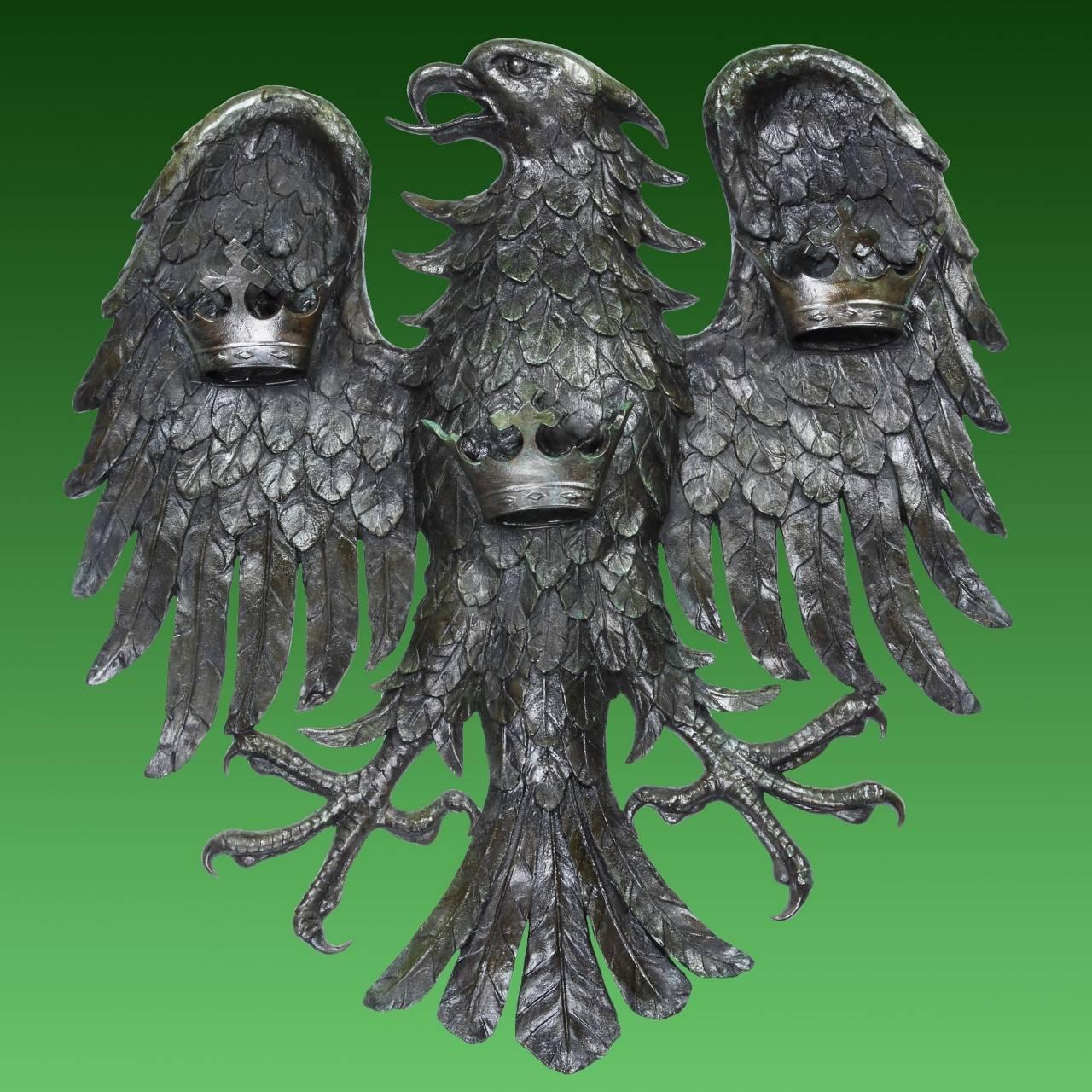 A very large and substantially heavy-cast bronze of a Spread Eagle, the symbol synonymous with the banking institution Barclays. With its original green-brown patina, this high-relief bronze most likely came from outside a branch or office, and