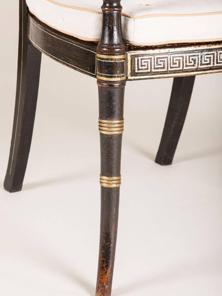 A Regency Black Painted Elbow Chair 1