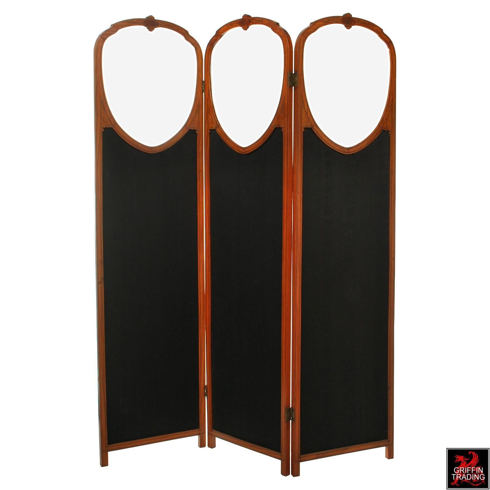 This is an exquisite English or continental satinwood three-panel screen with finely inlaid floral marquetry and ebony and boxwood stringing. Each panel is 18? wide and topped with a large shield shape framed glass panel with 1/4? wide bevel. The