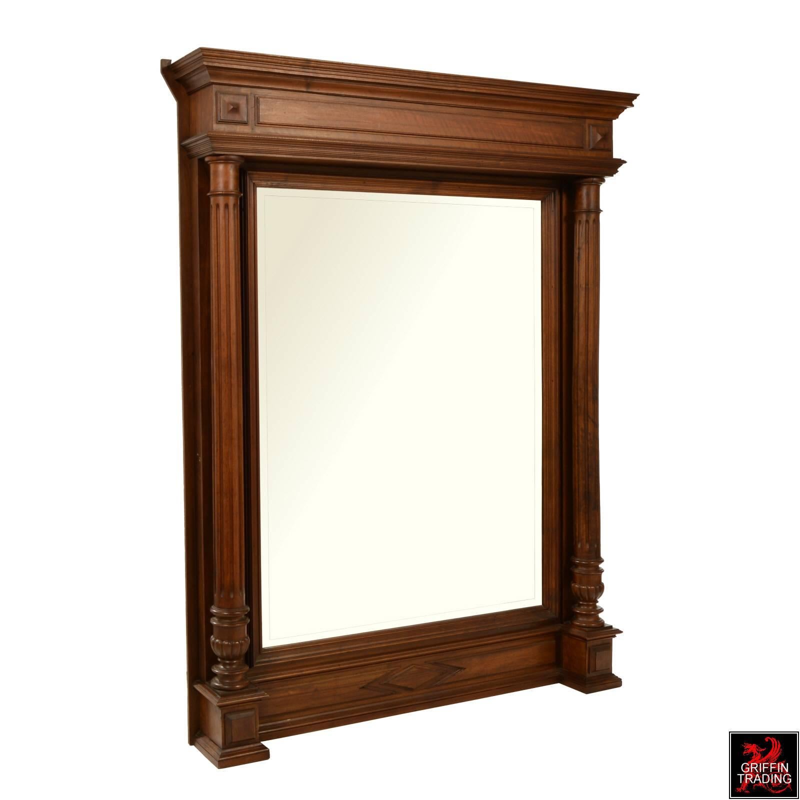 Hand-Carved 19th Century French Bevelled Wall or Overmantel Mirror with Walnut Frame For Sale