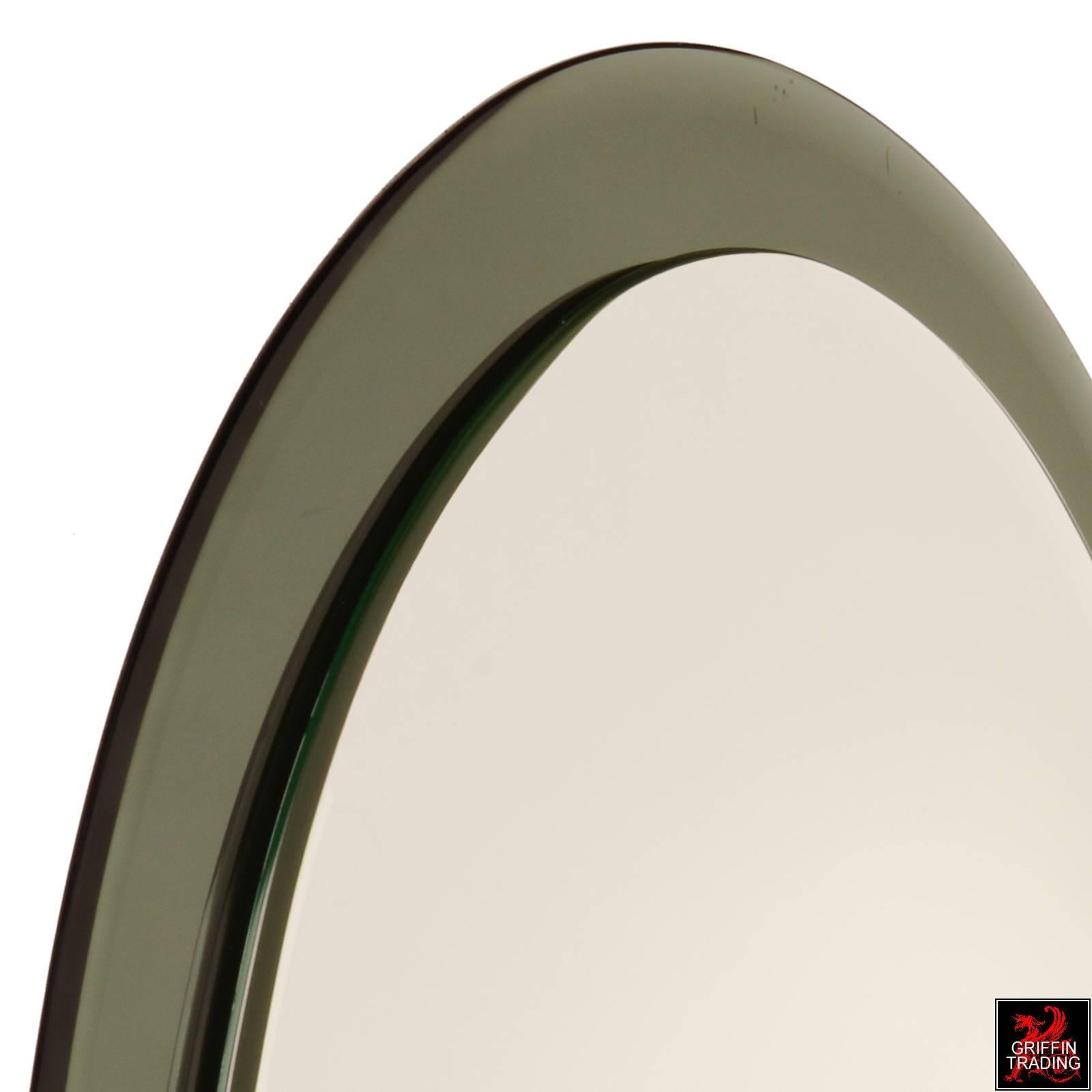 Mid-20th Century Italian Oval Shaped Beveled Wall Mirror in the Style of Fontana Arte 7709 For Sale