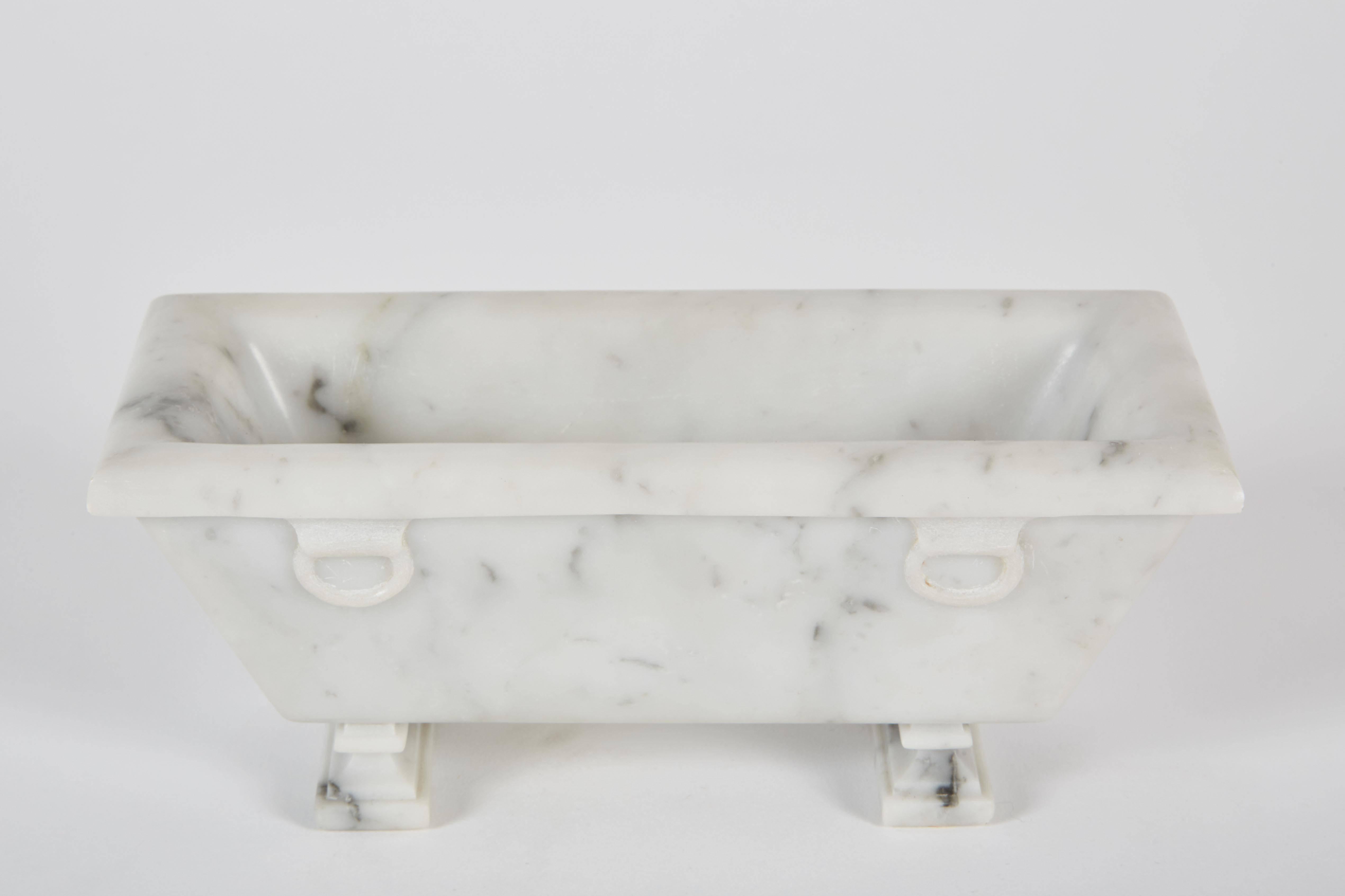 19th century Italian Grand Tour miniature Italian veined white marble model of sarcophagus with lion head stands only 3 inches high. The marble of this model is Bianco di Carrara and represents a small bathtub. This would have been originally