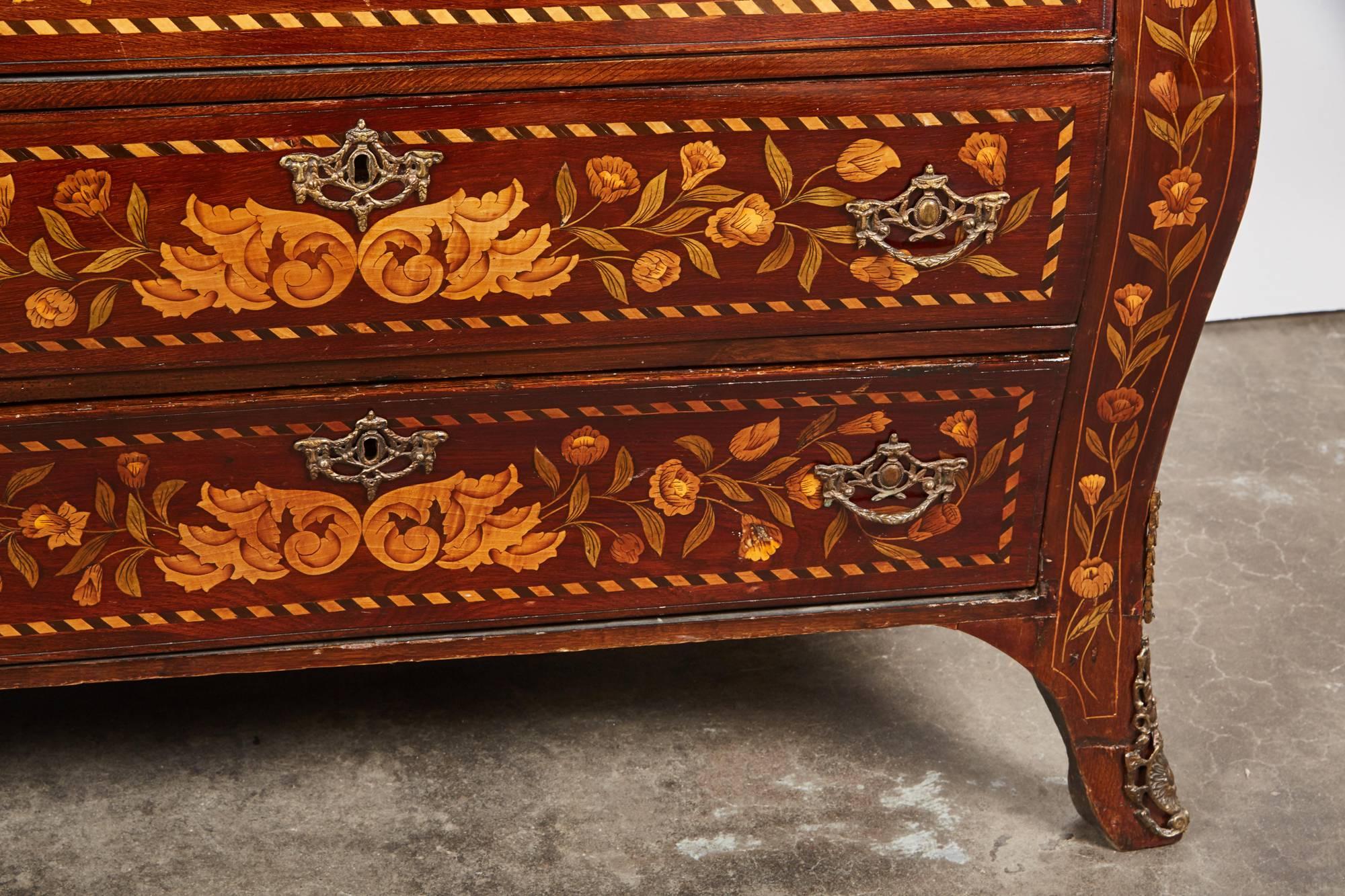 Dutch 18th Century Four-Drawer Mahogany Bow Front Chest with Inlaid Flowers 