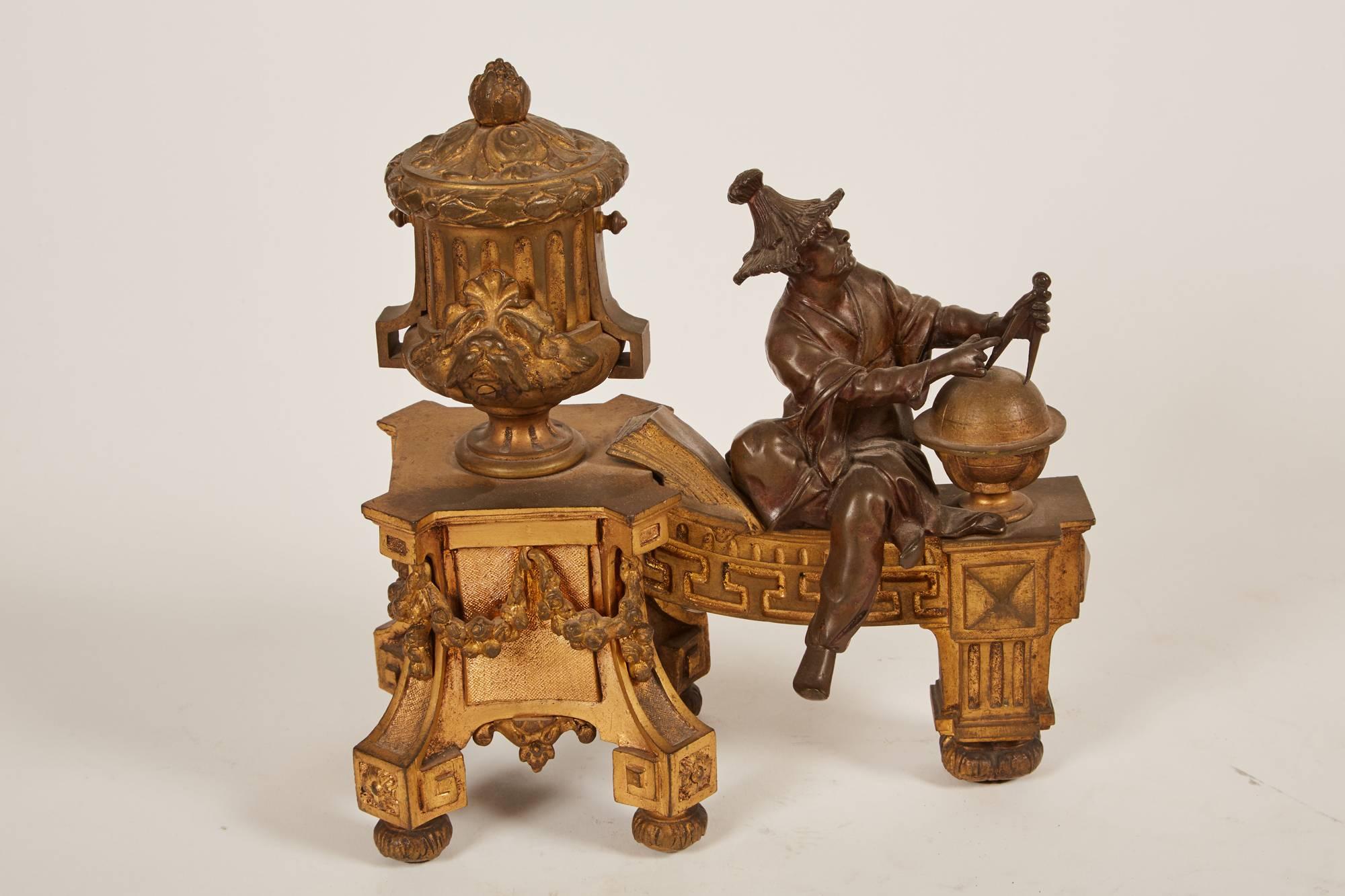 A pair of unique late 19th century, Chinese gilt bronze chenets, featuring two men portraying an astronomer and an astrologer with great ornamentation and swag detailing. In the transitional style, these two chenets have detailed fluting and other