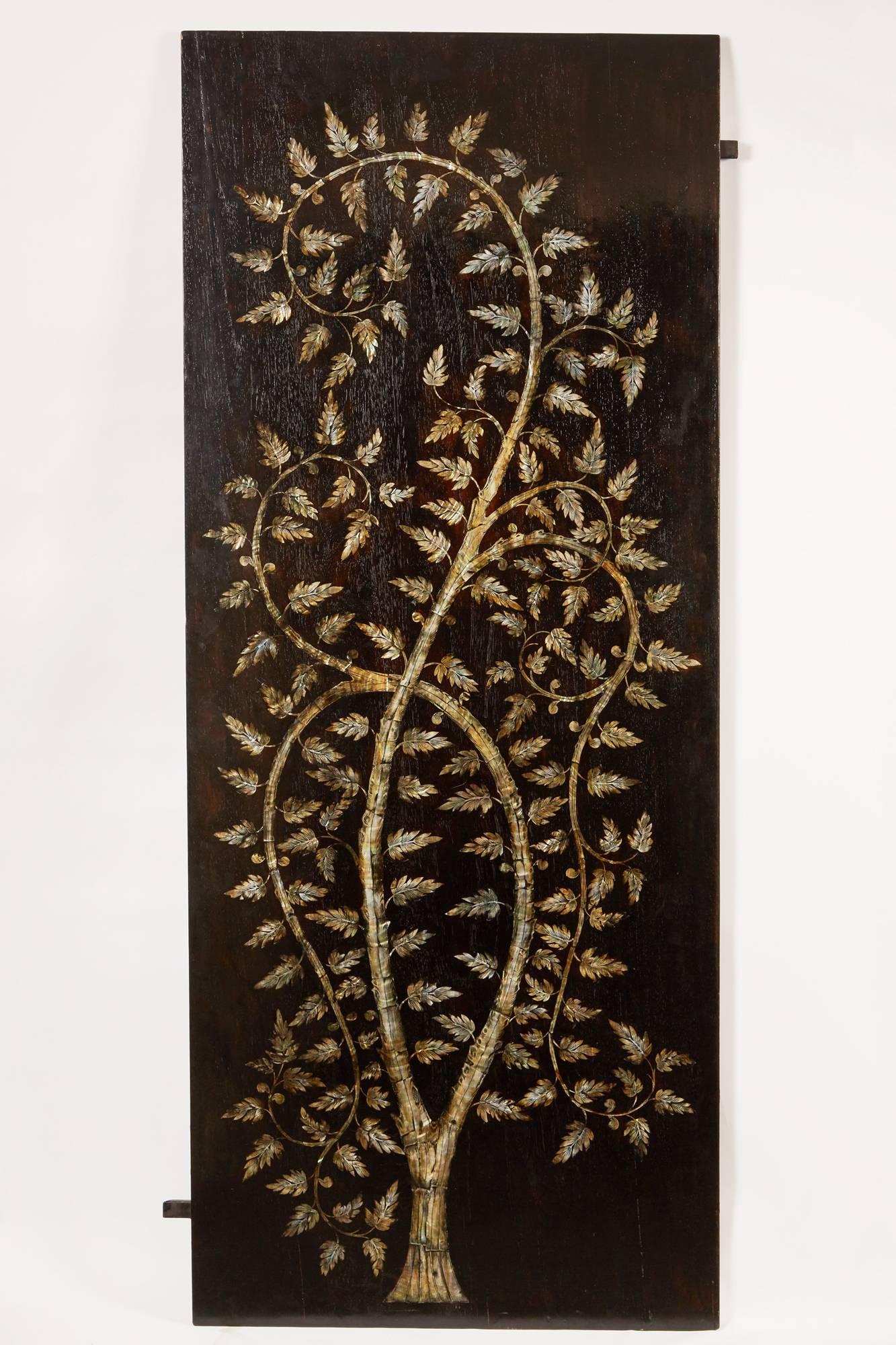 A pair of remarkable 21st century Vietnamese rosewood slabs that features a large centre “Tree of Life” design comprised of mother-of-pearl inlay.
