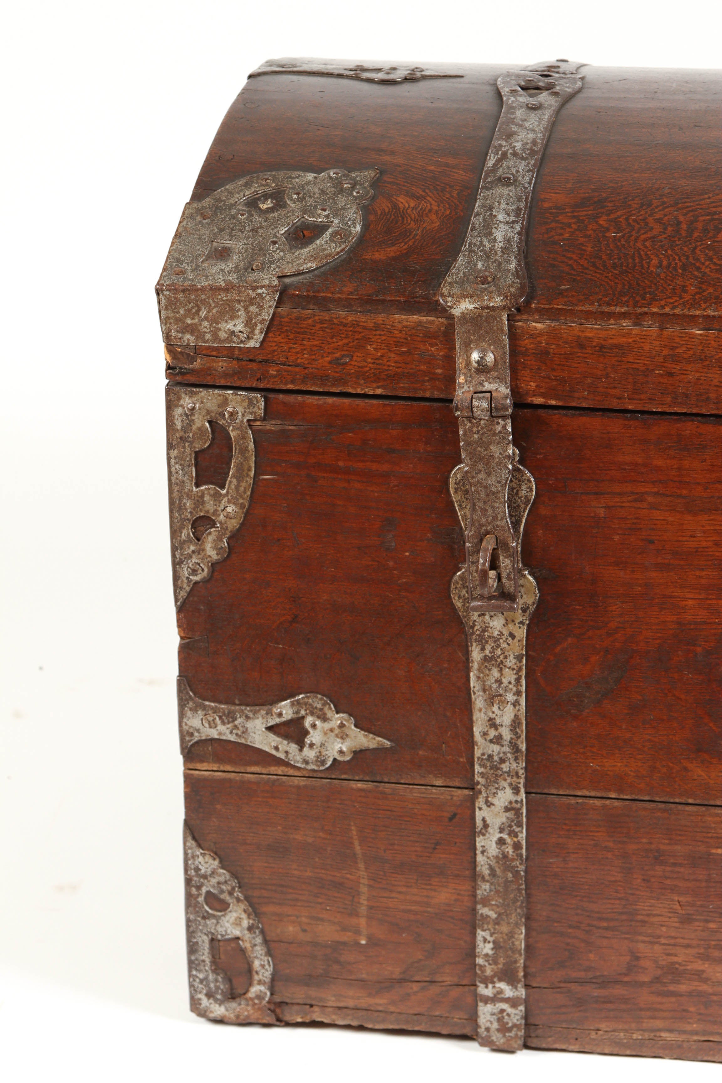 A late 18th Century Danish oak trunk with iron work. There are hinges, ironwork, accents and handles on all sides of this trunk.