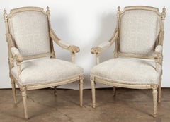 Pair of French Carved Louis XVI Armchairs