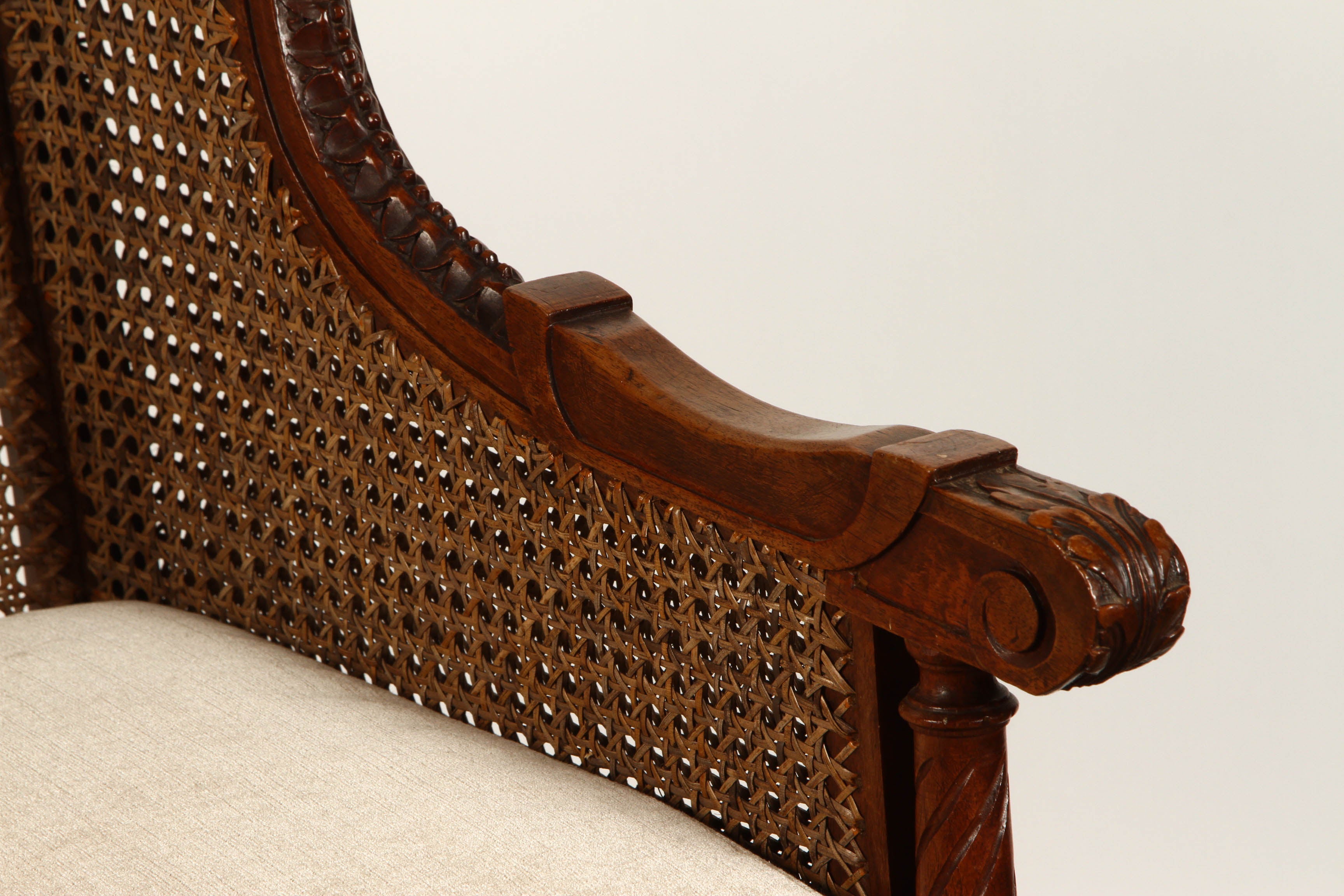 A French cushioned cane chair, circa 1890. The Cushion is new and the cane is very good condition.