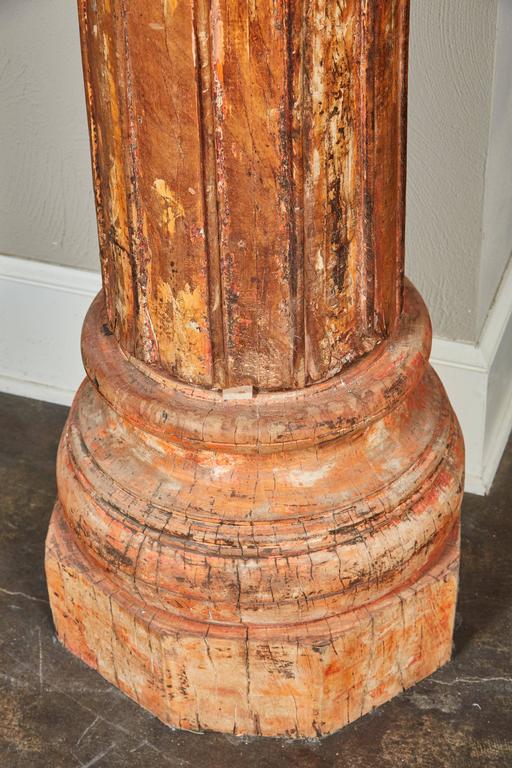 18th Century Pair of Orange Tall Indian Teak Wood Pillars For Sale at