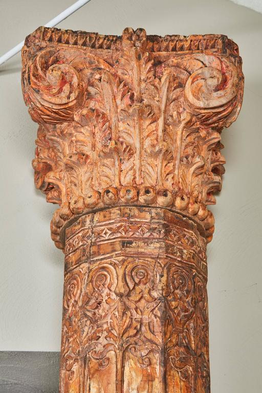 18th Century Pair of Orange Tall Indian Teak Wood Pillars For Sale at