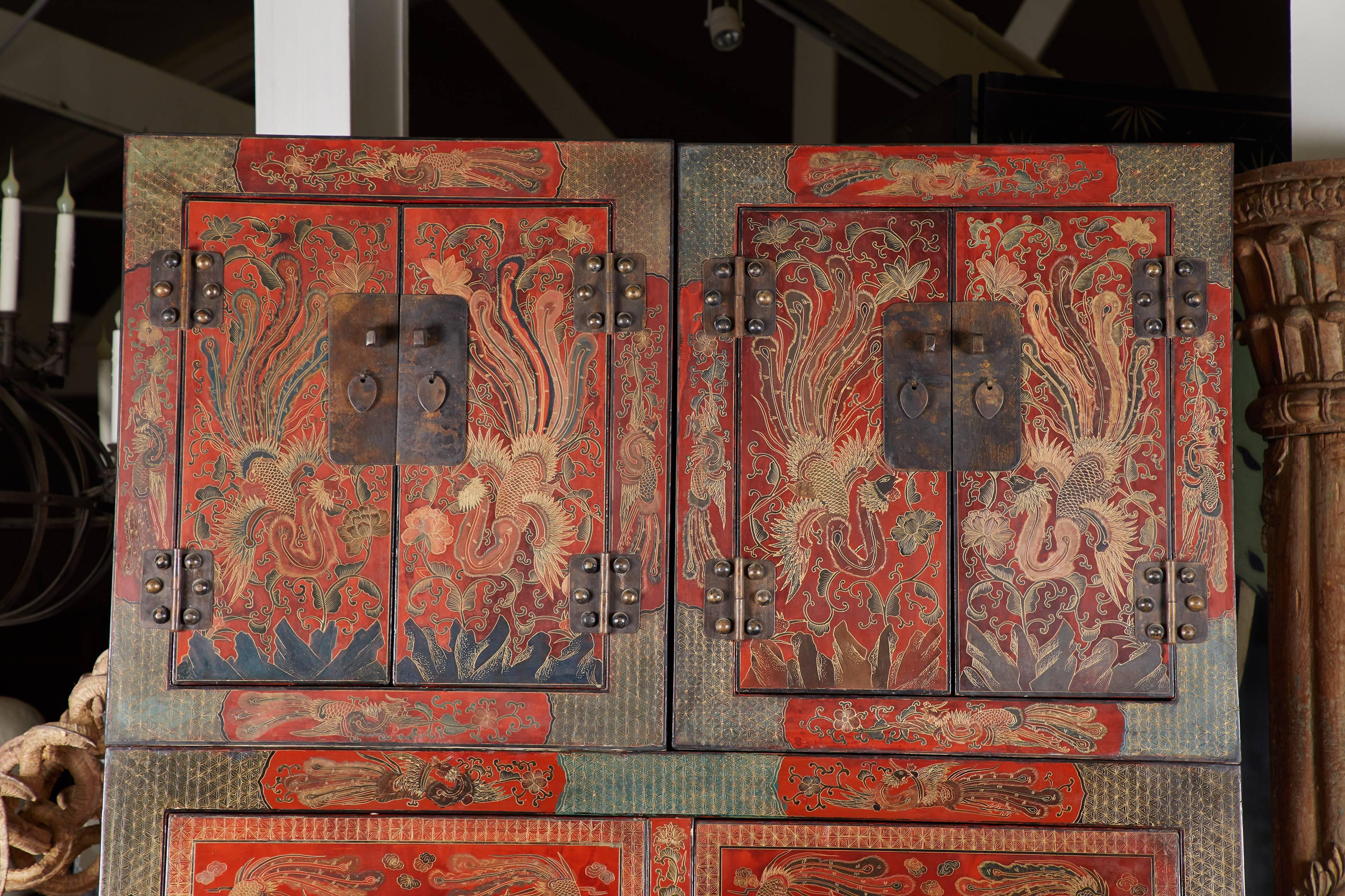 Pair of 20th century Chinese Coromandel cabinets. Measure: Hat cabinets are each 27 1/2” H x 24 1/2” W x 21” D.