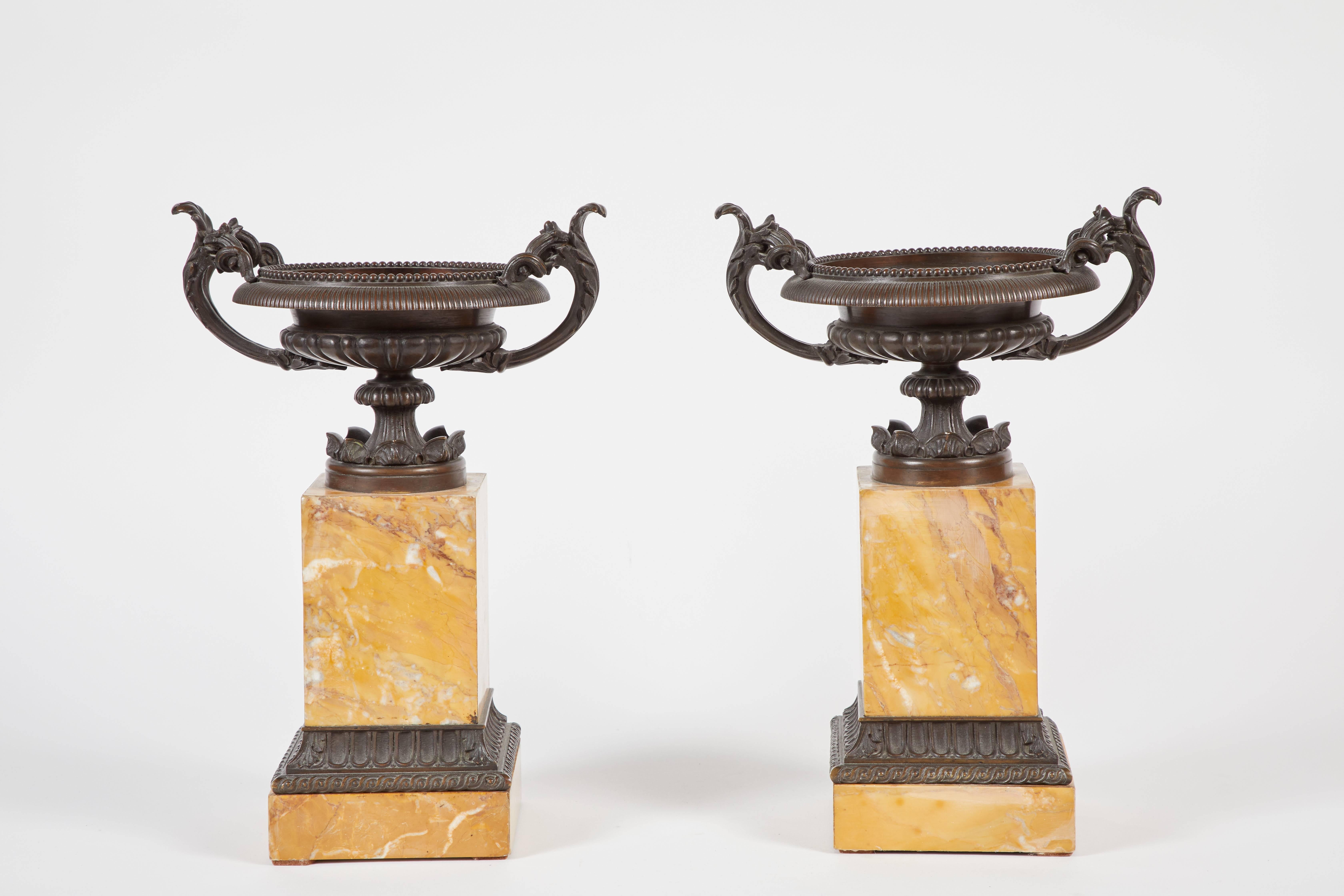 A pair of Italian Tazzas. Featuring Gallo Antigo marble bases and bronze urns, circa 1830.