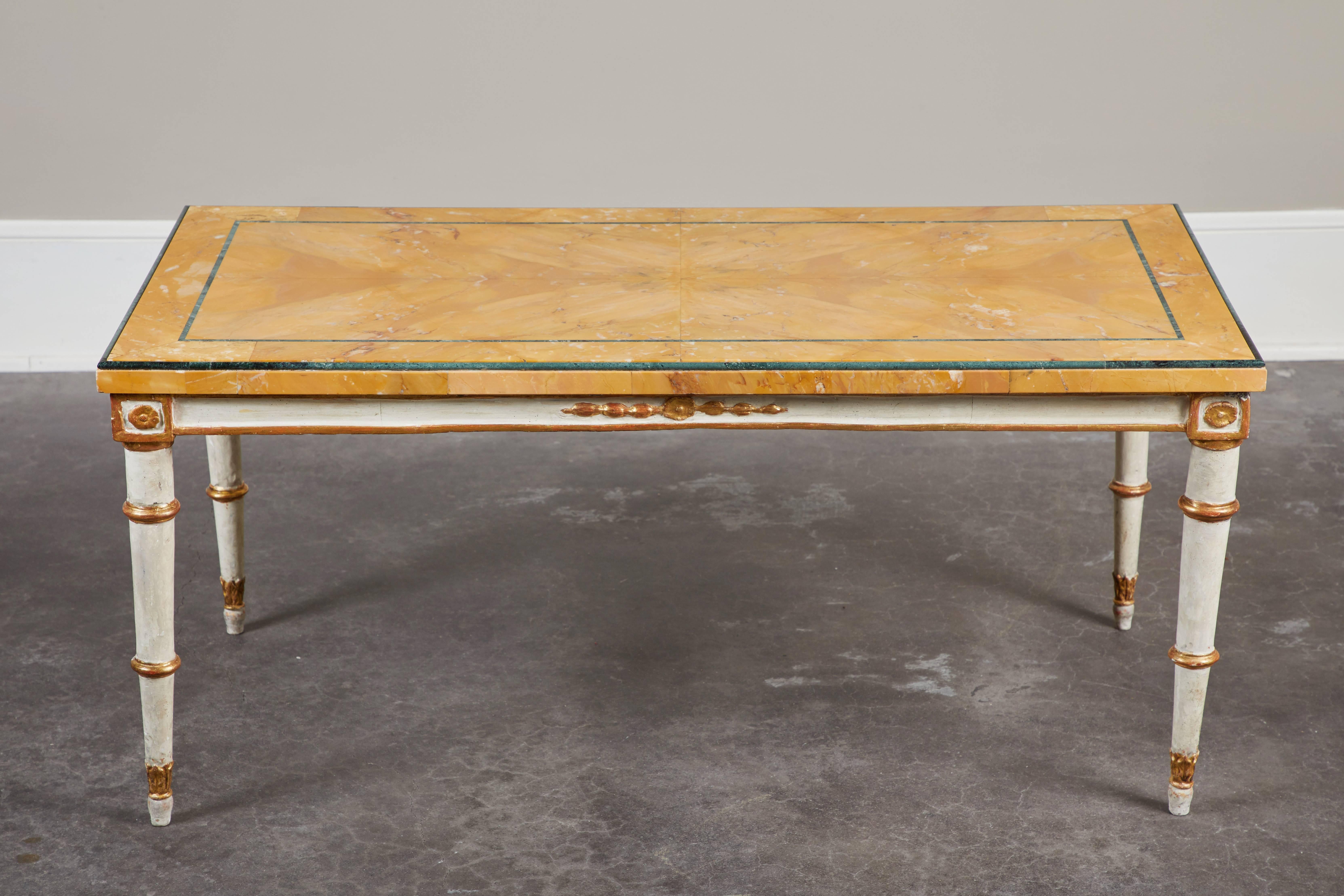 A 19th century marble-top and pine base coffee table. The top is Italian Gallo Antigo marble, with a pine base made from a Swedish Gustavian stool, circa 1800s.
