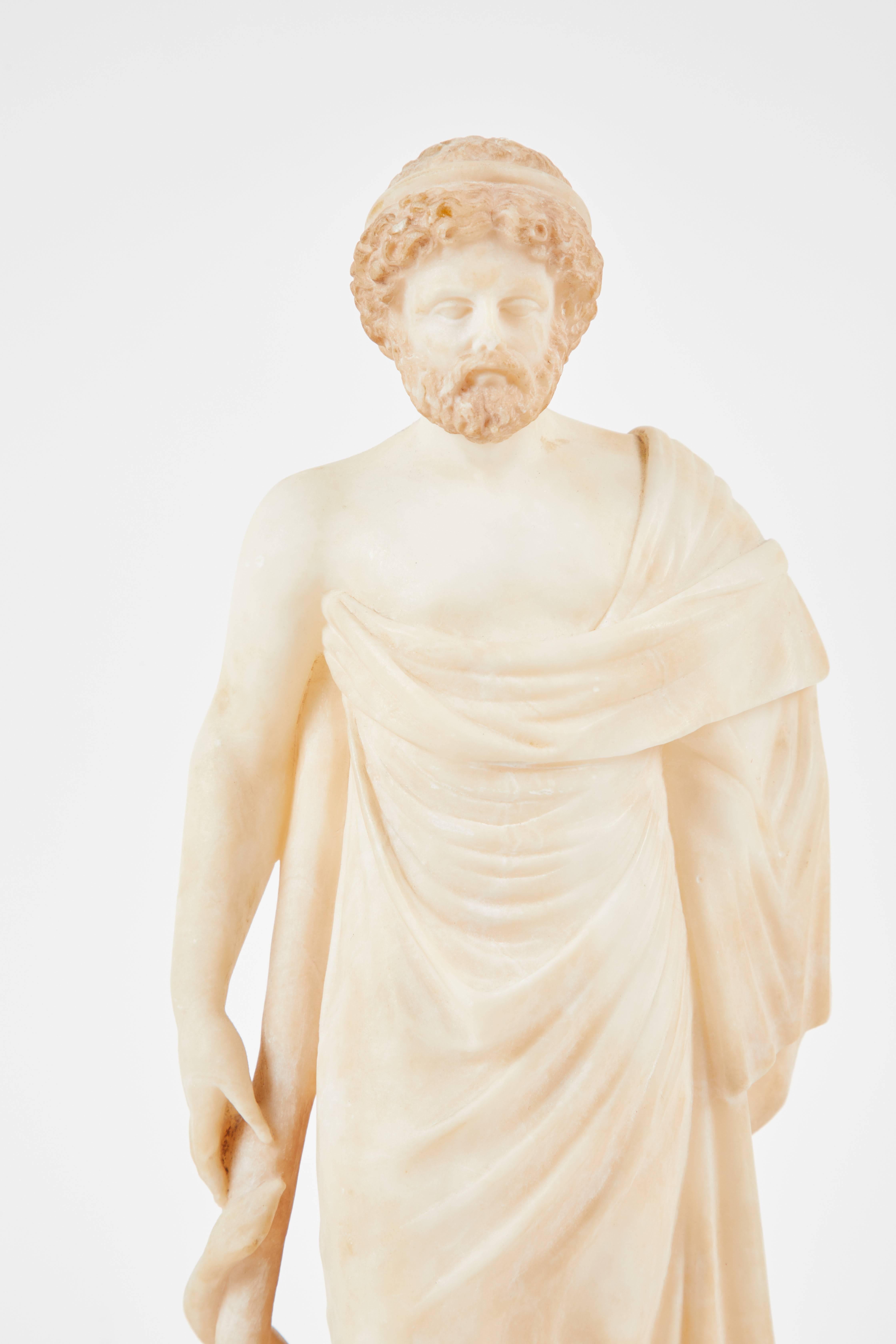 An Italian alabaster sculpture, circa 1860.  Perfect for desktop, coffee table or bookcase accessorizing or to add to an existing collection of 19th century sculptures.
