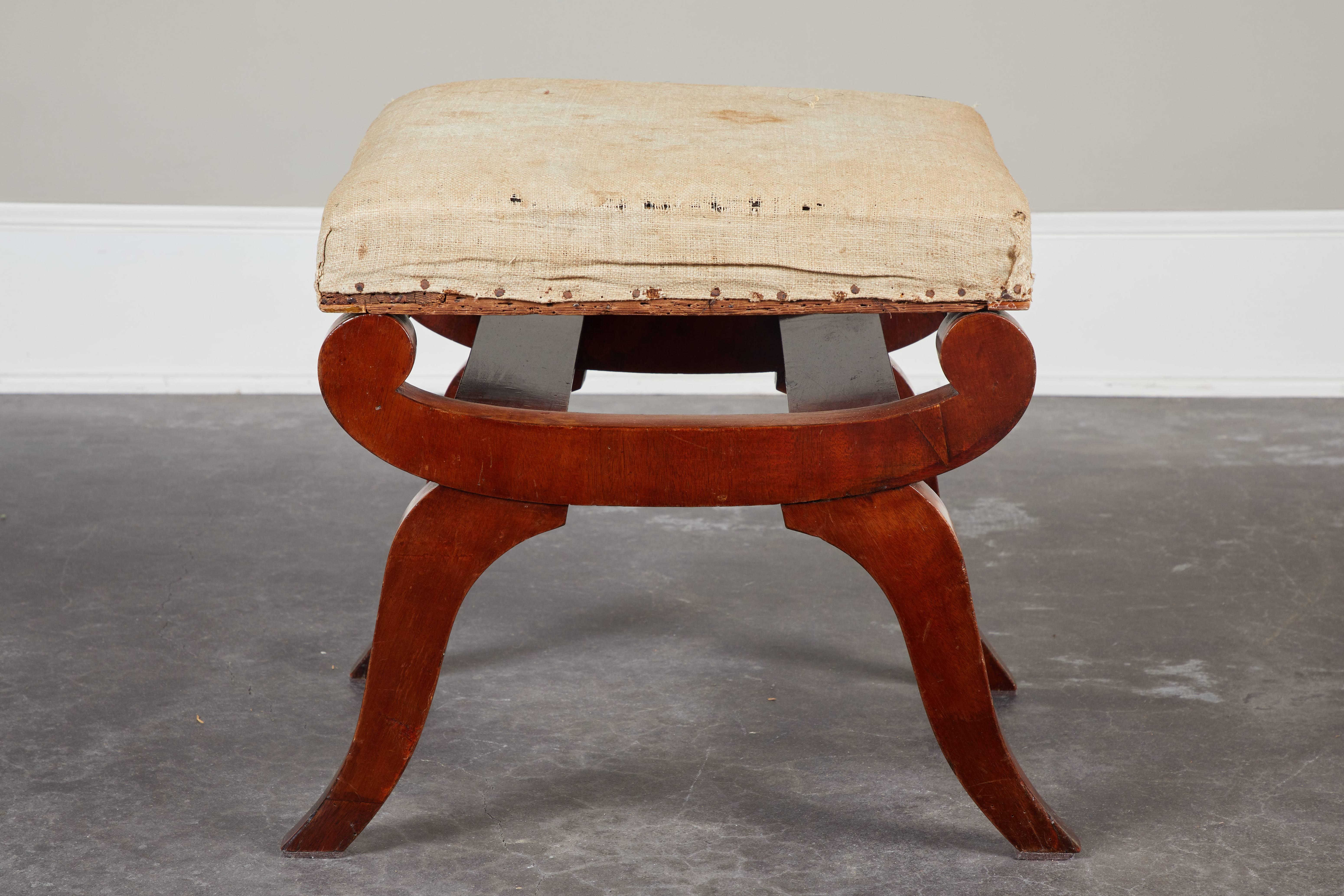Set of four early 19th century Swedish mahogany stools.