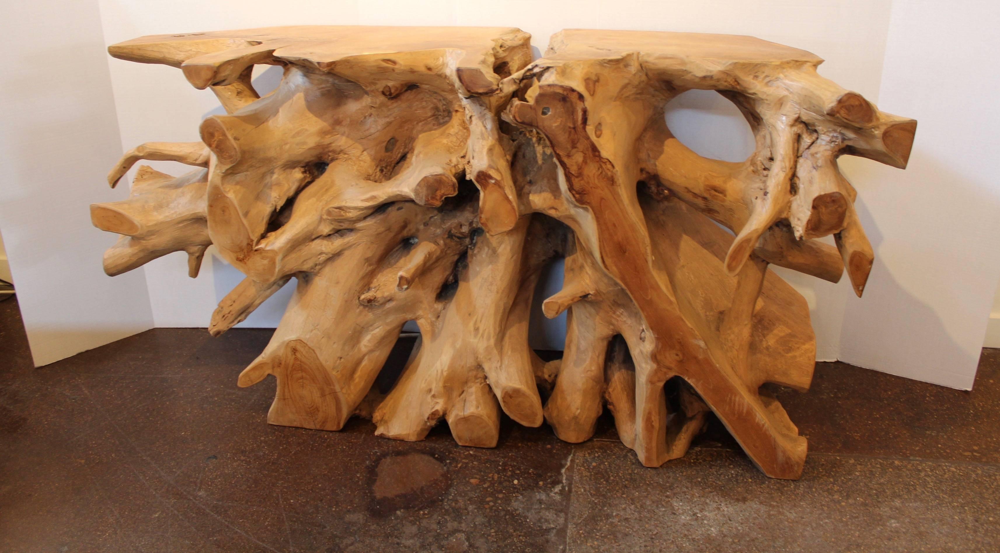 Teak root console.
Natural, organic form of a modern console.
From a single tree section under the roots of a teak tree.
Can be used for outdoor or indoor.
If used for outdoor decor, exposed to sun without shade, will turn naturally bleach white.