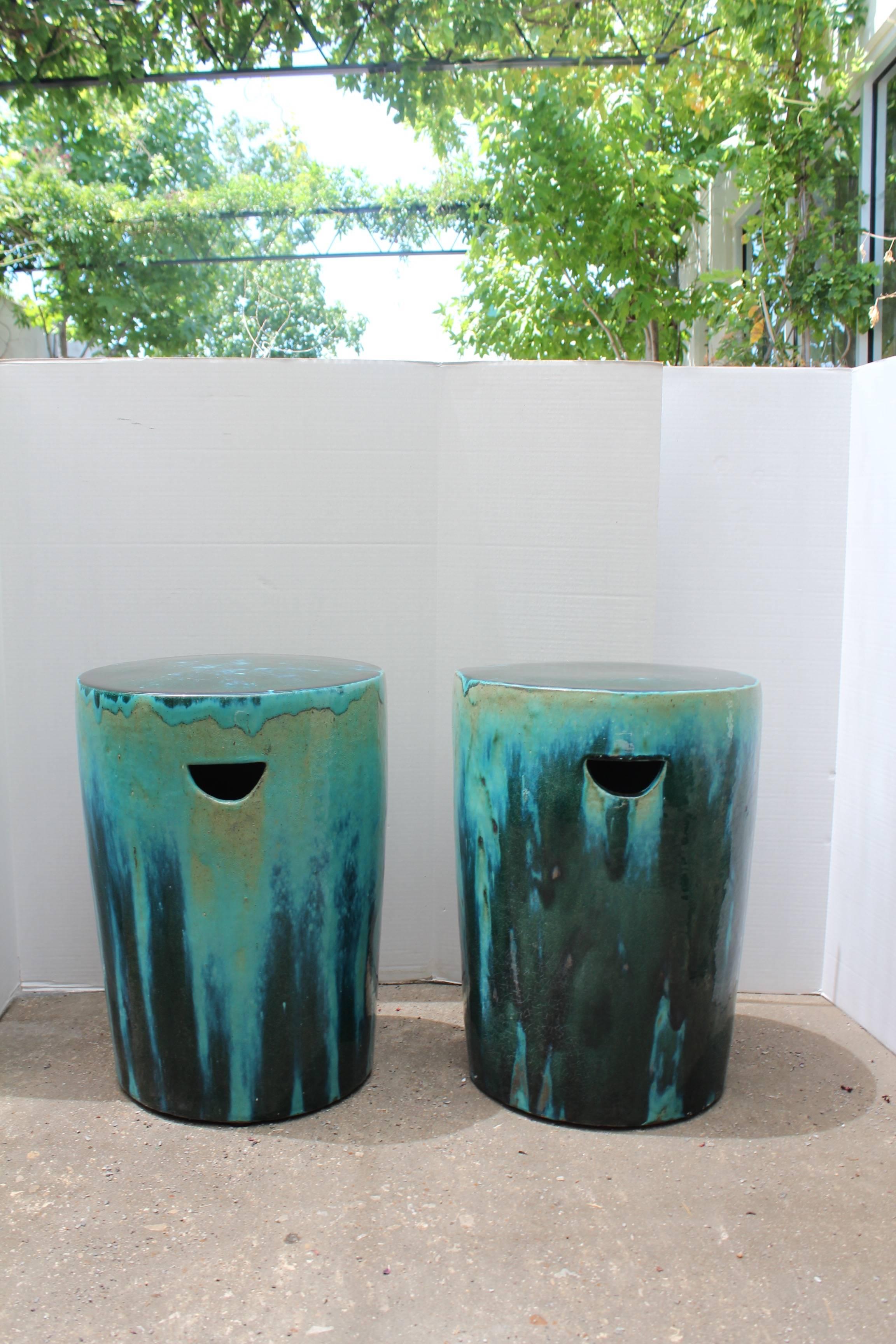 Deep blue and green dipped glazed ceramic garden stools.

Vibrant mixed colors of blue, green and celadon with a dipped glazed effect showing one of a kind beauty.

Can be used indoor or outdoor. Ceramic stools made by hand.
 