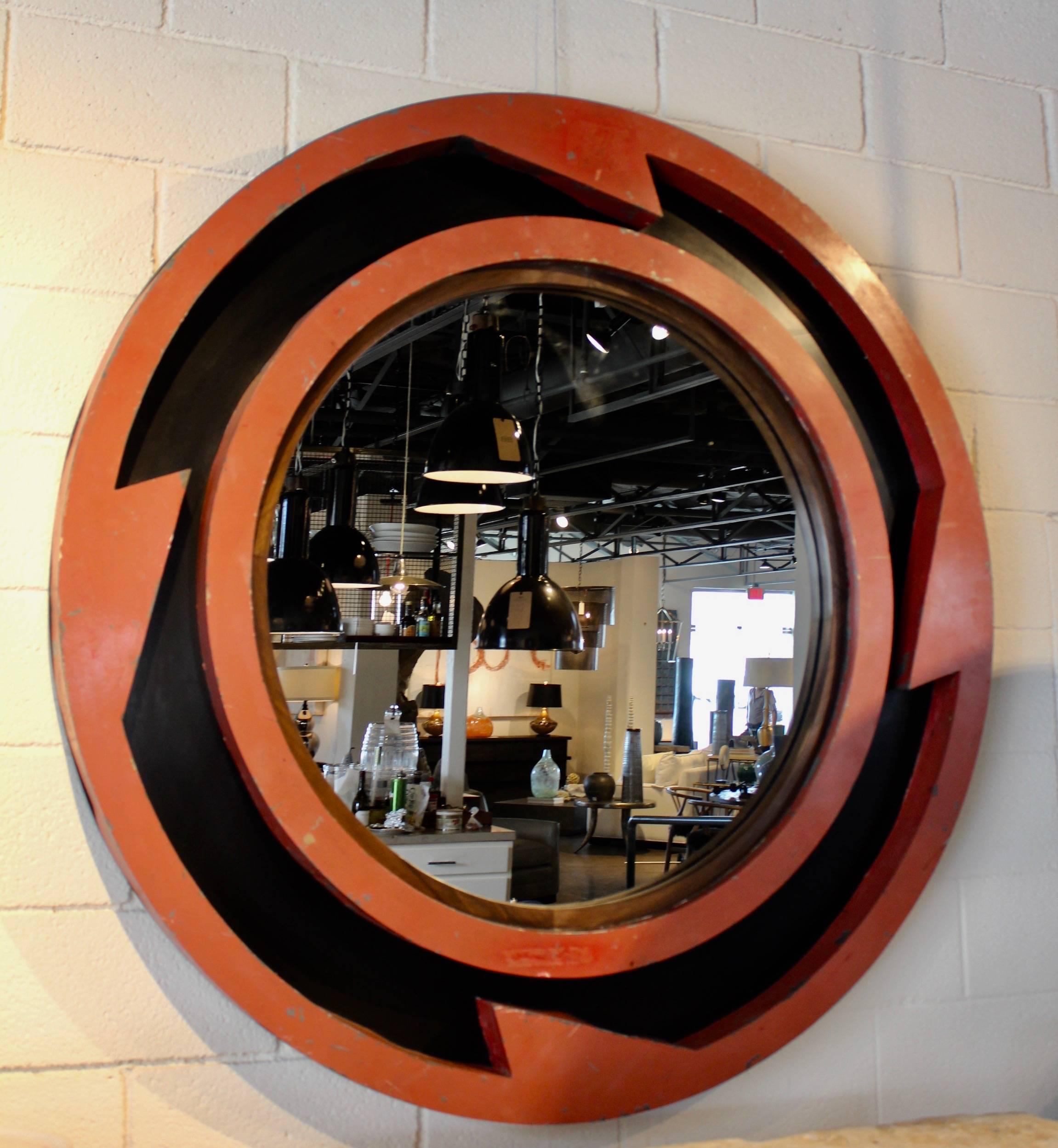 Vintage Art Deco mirror.  

Faded oriental red mixed with black index frame and custom mahogany center around mirror. Used as a French tole element used as a commercial sign, turned into mirror, 1960s. 

 